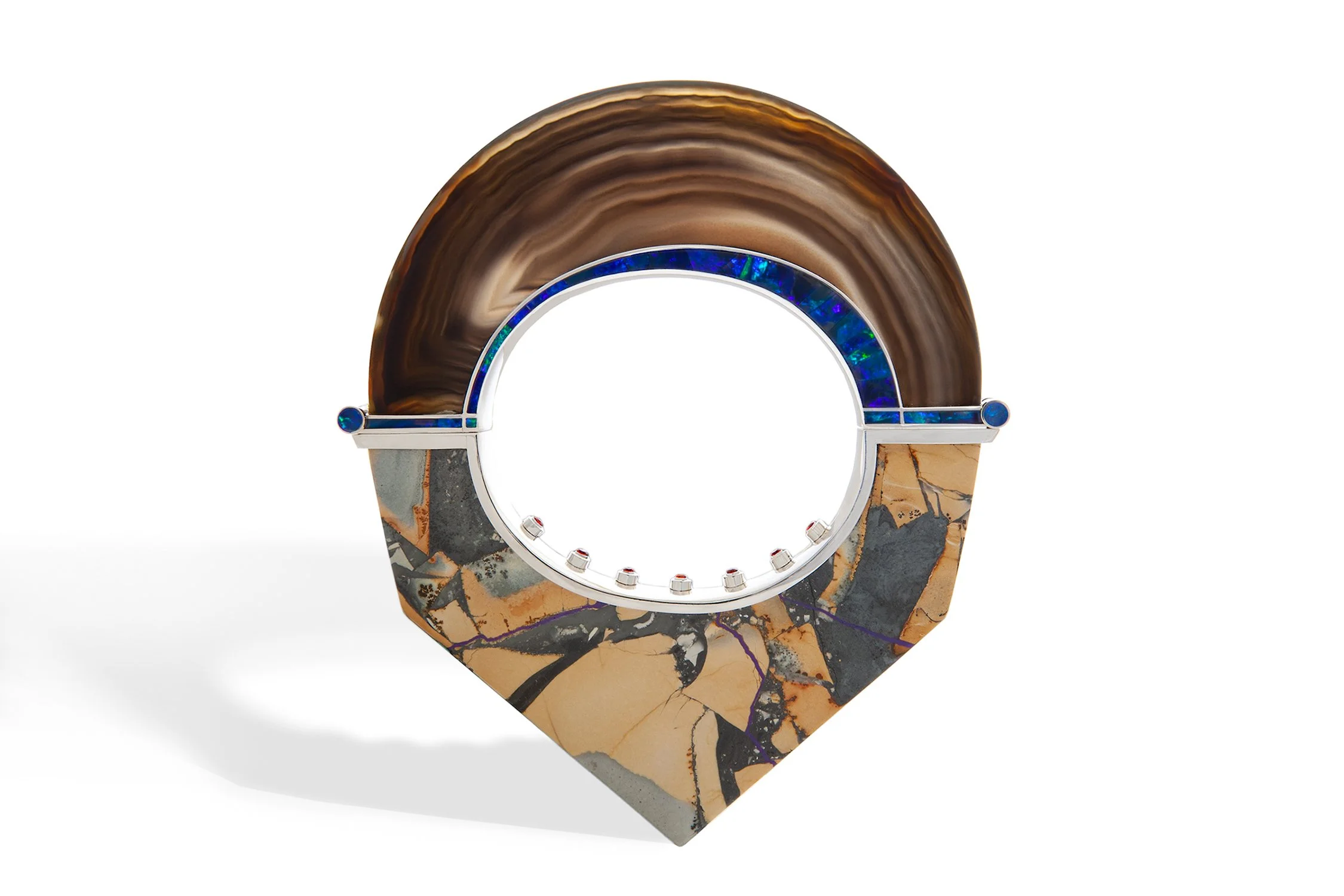 A decorative clock featuring marble and blue mosaic details.