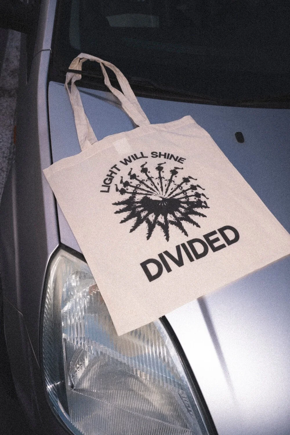 2025-12-03_Divided Merch-c Camille Mortier-8.jpg