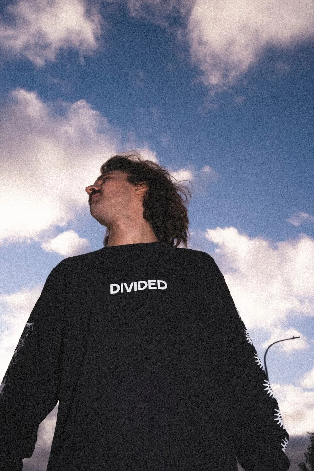 2025-12-03_Divided Merch-c Camille Mortier-3.jpg
