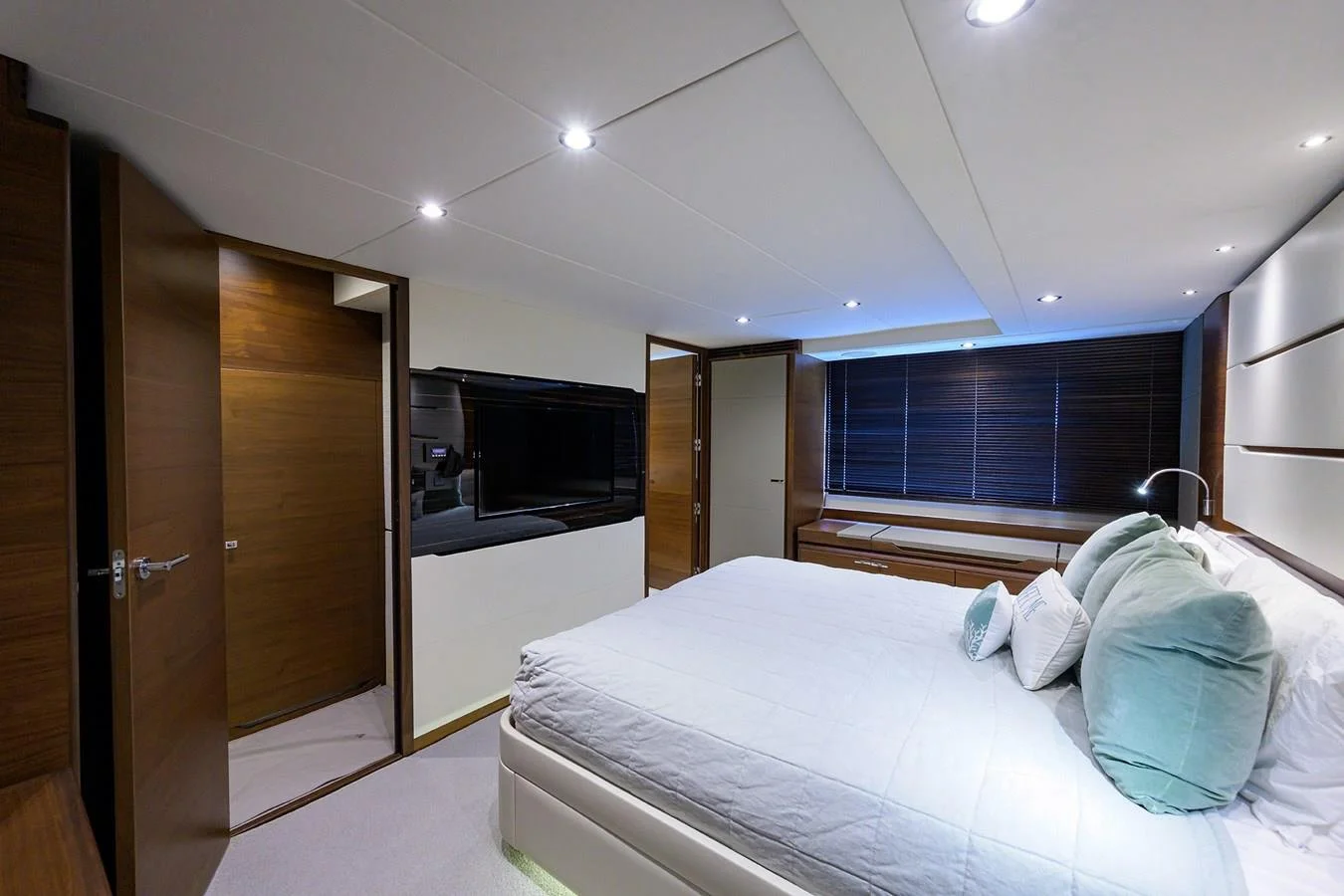 Master stateroom interior aboard Paulasea, a luxury Princess 68 Flybridge yacht available for private charter in Palm Beach, Florida.