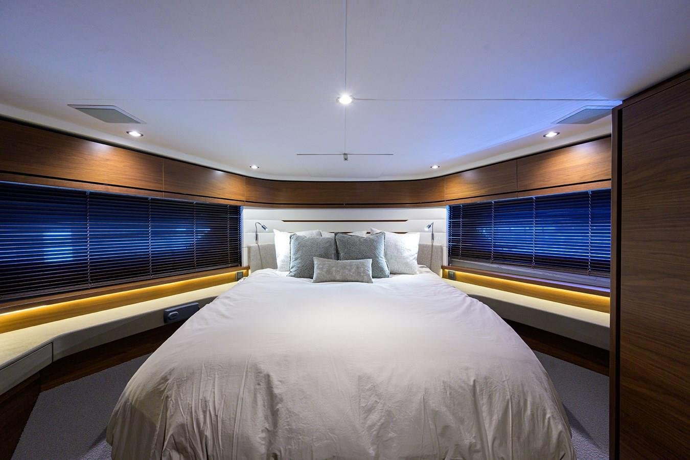 Forward VIP stateroom aboard Paulasea, a privately owned Princess 68 Flybridge yacht available for private charter in Palm Beach, Florida.