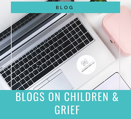 Cover of a blog post titled 'Blogs on Children & Grief' with a laptop, pink case, and a notebook on a white desk.