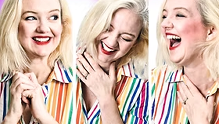 Three women with blonde hair and wearing colorful striped shirts smiling and laughing.