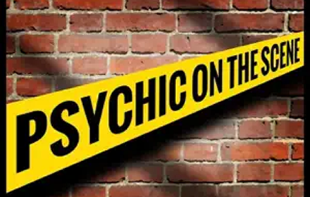 Yellow and black caution tape with the words 'Psychic on the Scene' against a brick wall background.