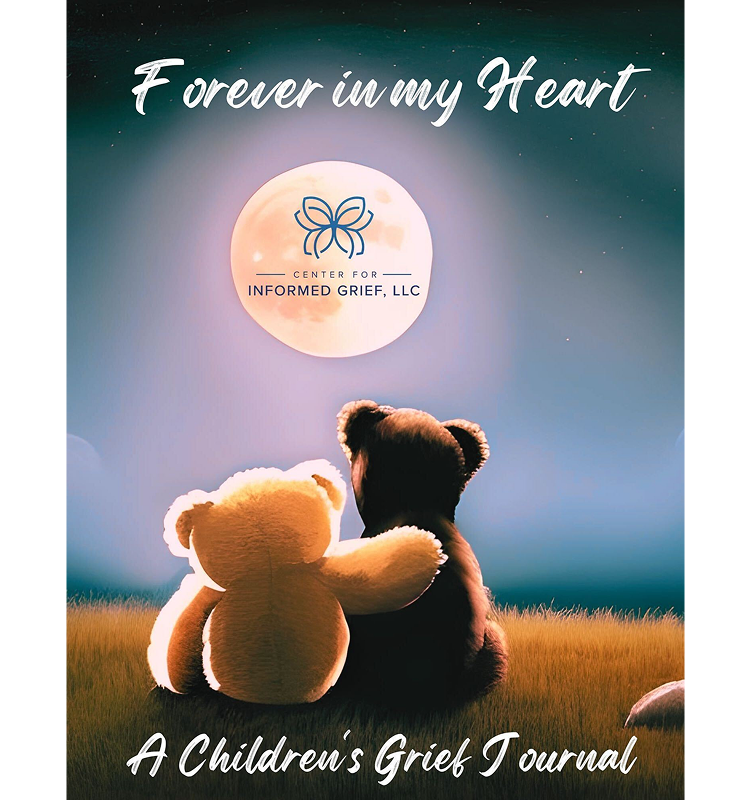 Two teddy bears, one light-colored and one dark-colored, sit together on grass under a full moon with a starry night sky, promoting a children's grief journal by the Center for Informed Grief.