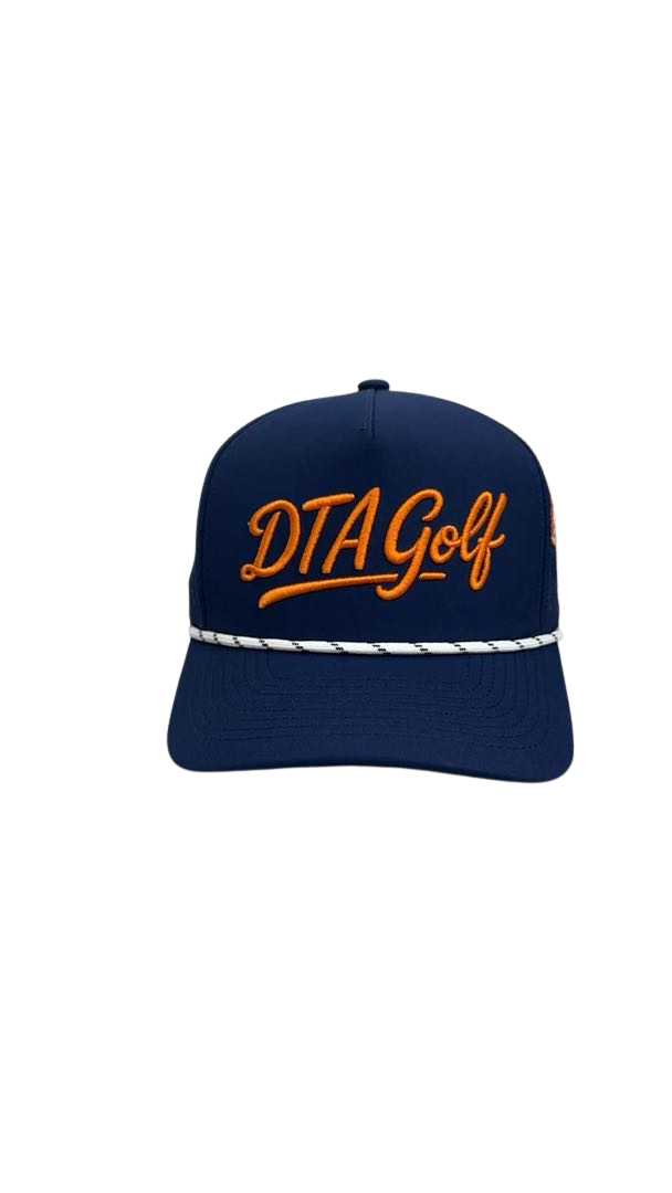 A navy blue baseball cap with orange embroidered text that reads "DTA Golf" and a white twisted band around the brim.