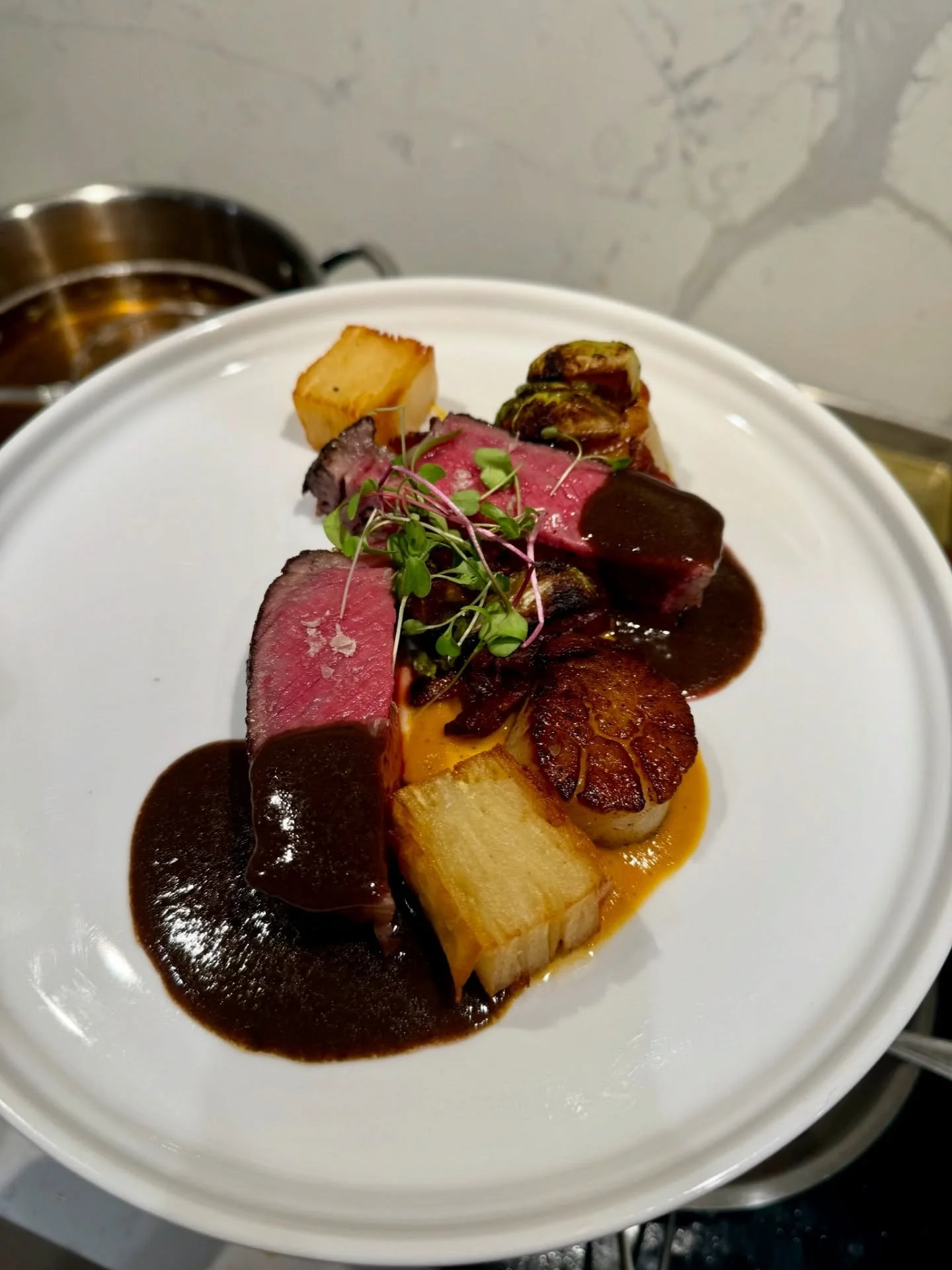 Some dishes don&rsquo;t just impress, they set the tone for the entire evening. ✨

Our signature steak and scallops are crafted with care, plated with intention, and brought straight to the comfort of your home, vacation rental, or private venue.

At