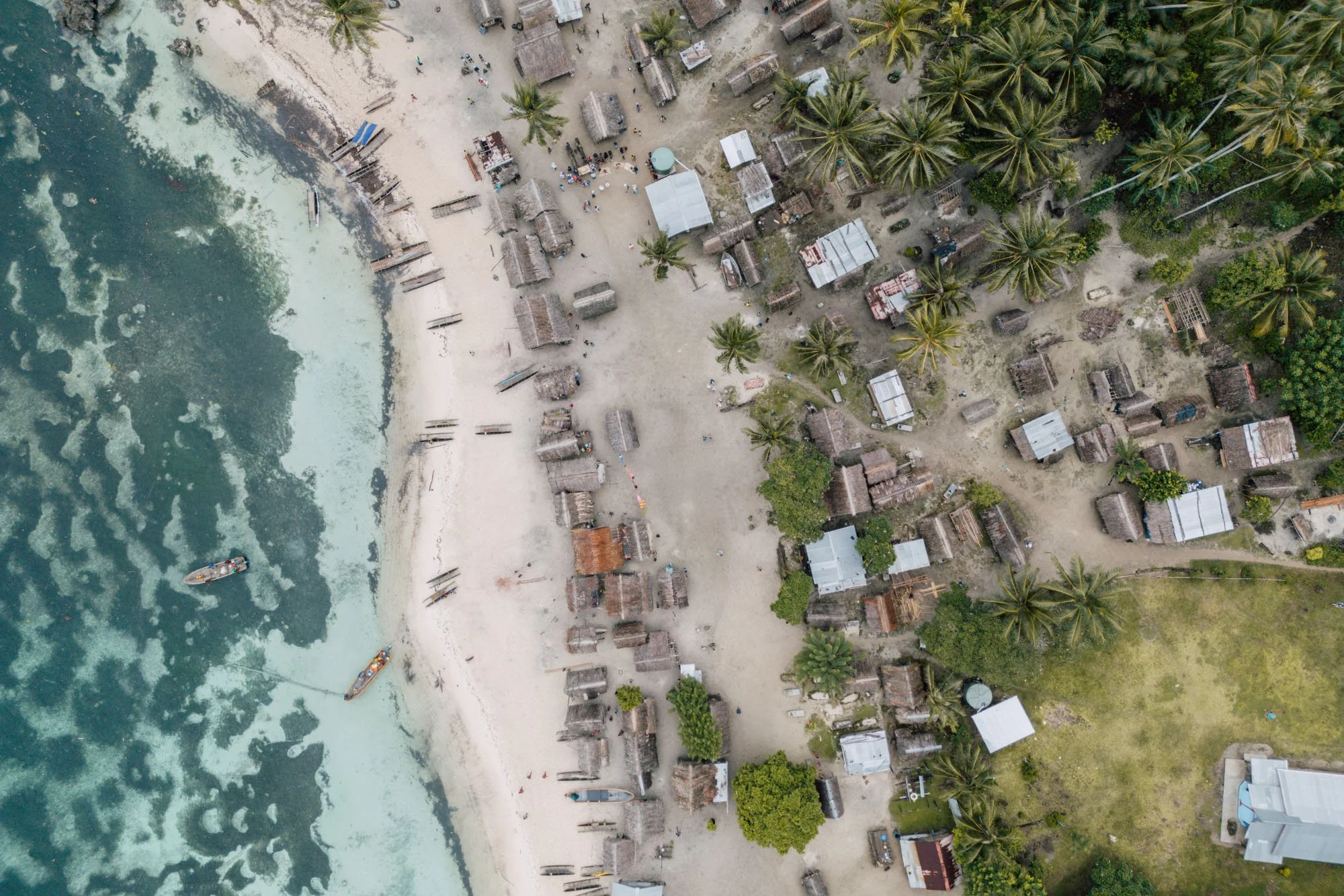 Aerial view of tropical coastal village in the South Pacific