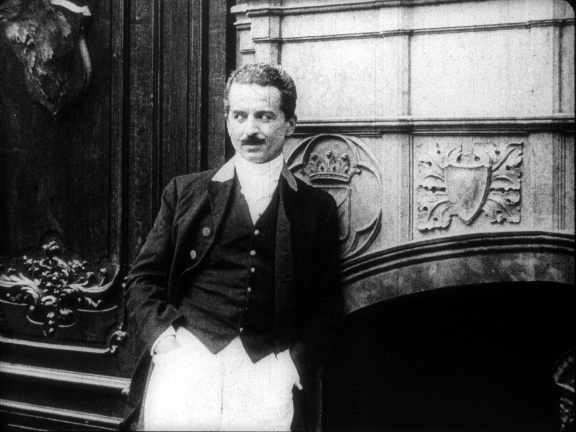 Sartorys looks off left at Mrs. D’Aquila in 1917 film version of The Whip directed by Maurice Tourneur. 