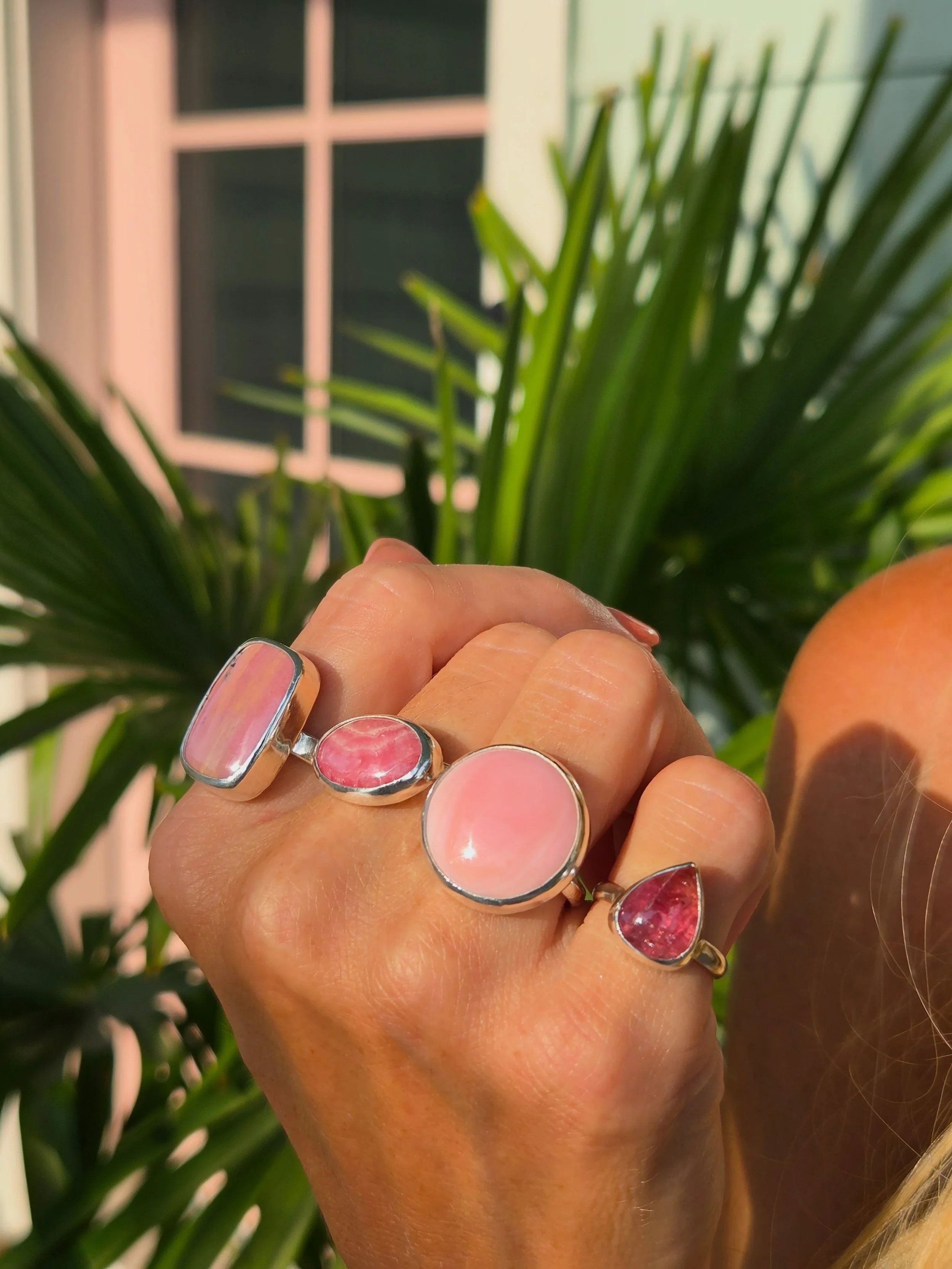 Perfectly PINK. As is my front door. From left to right we have Brazilian Rhodonite, Argentinian Rhodochrosite, Bahamian Queen Conch, and a Brazilian Imperial Topaz. Each a One-Of-A-Kind Earth Mined Genuine Natural Gemstone. They are exquisite stones