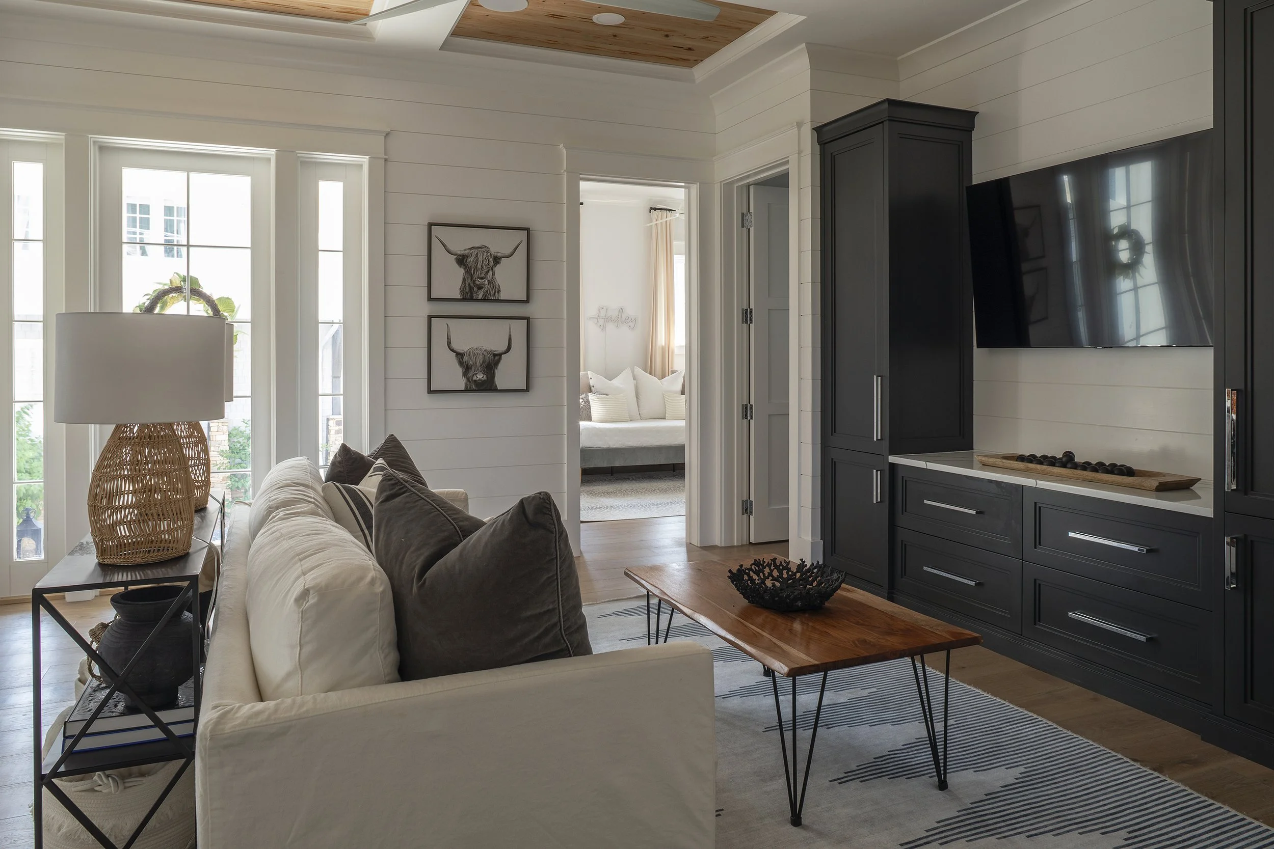 Coastal living area with custom built-ins and natural light