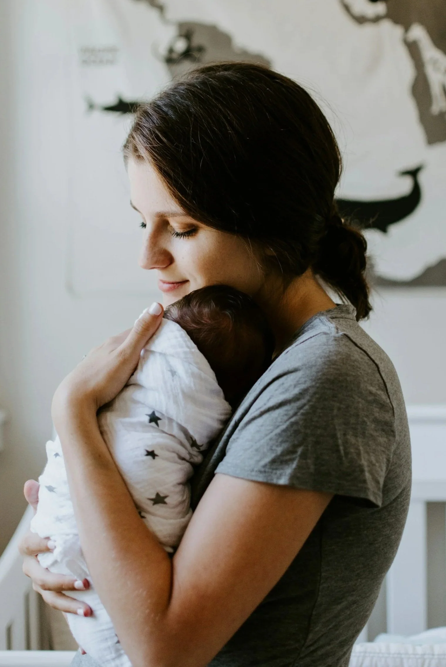 postpartum mother reflecting on baby blues vs. postpartum depression and anxiety while navigating new motherhood in Massachusetts.