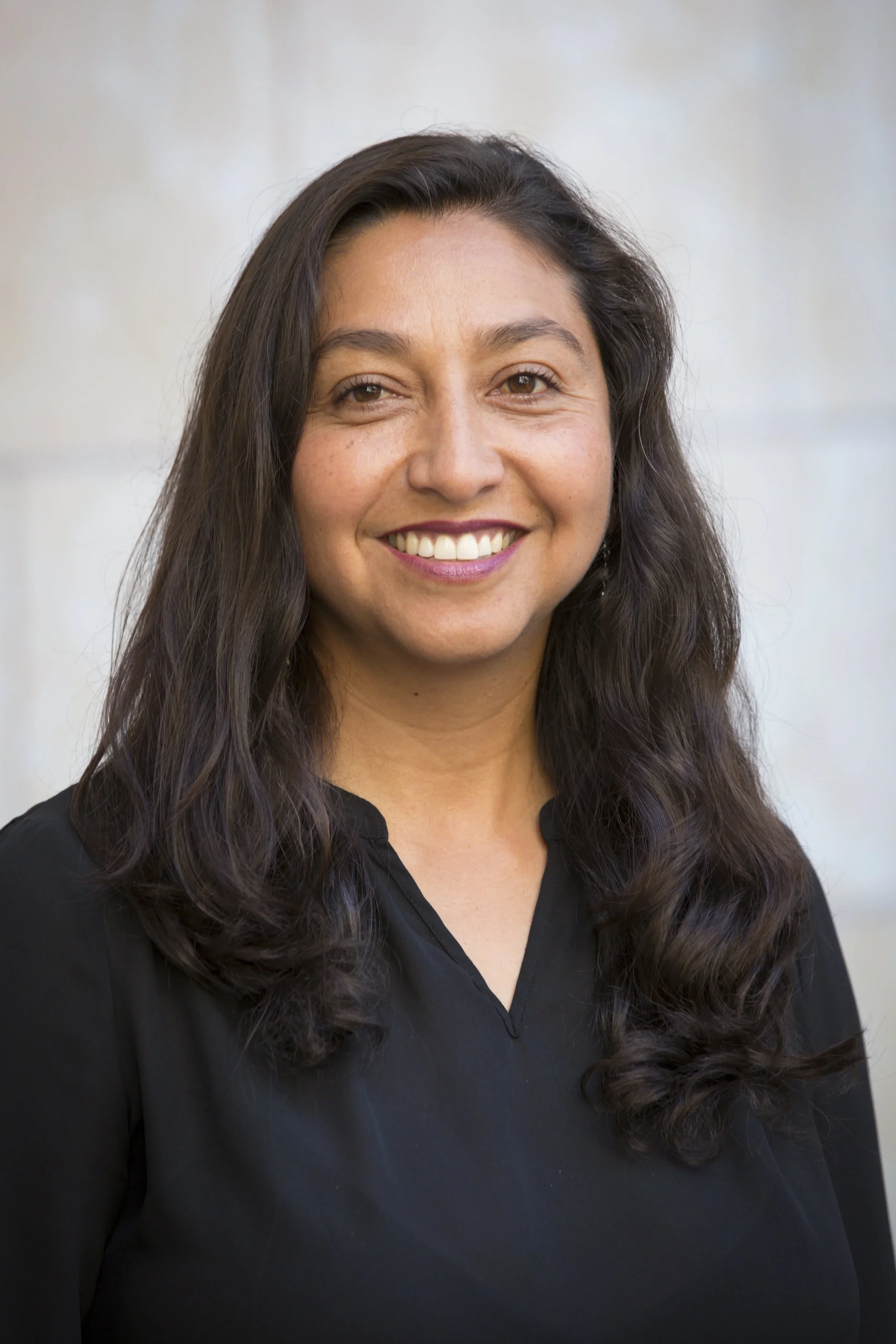 Professional headshot of Rita Mancera Hernandez