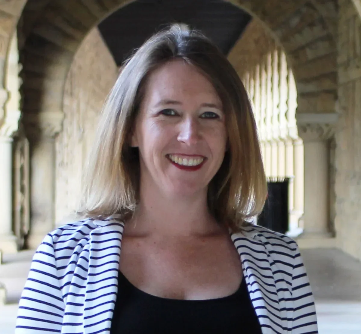 Professional headshot of Paitra Houts