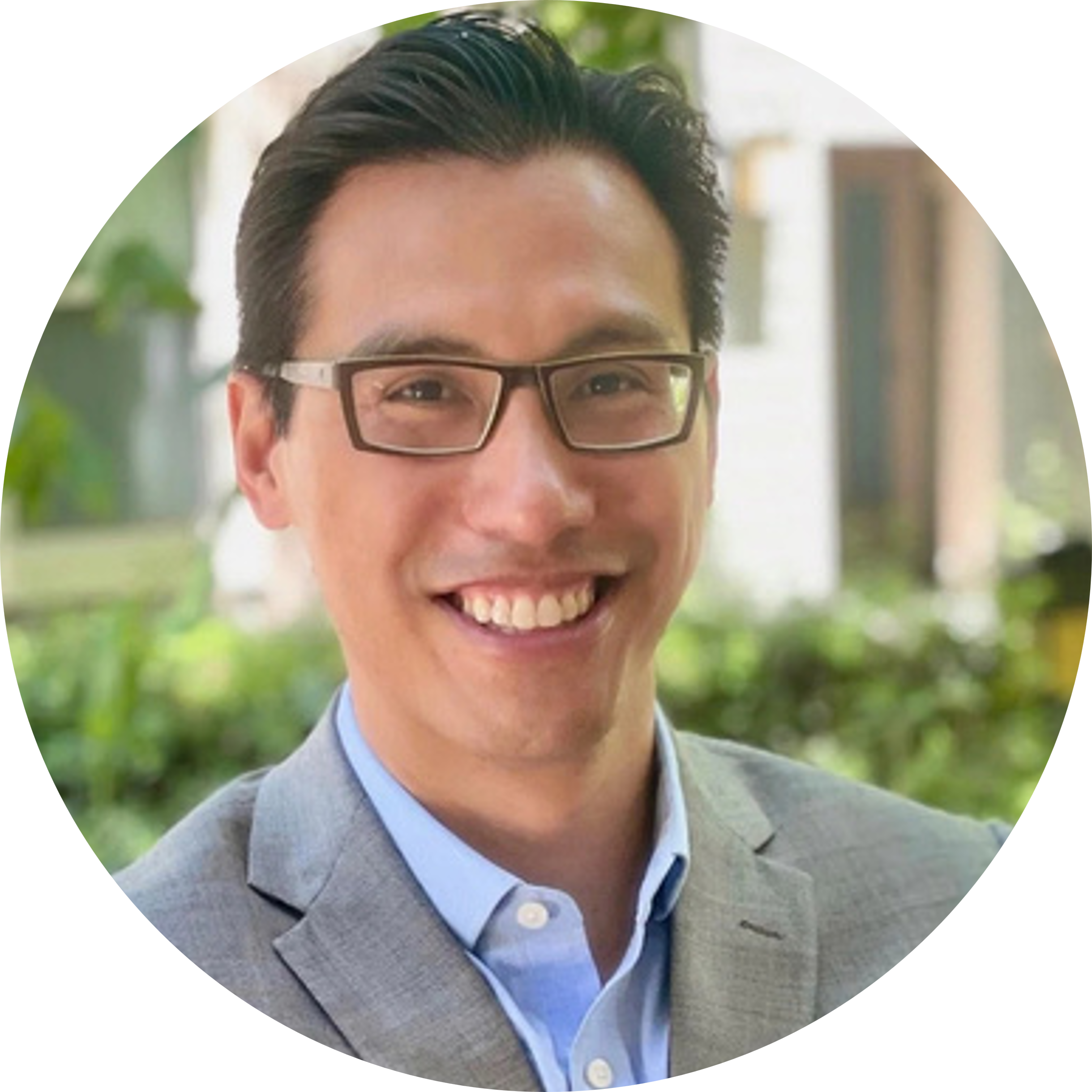 Professional headshot of Rolland Janairo