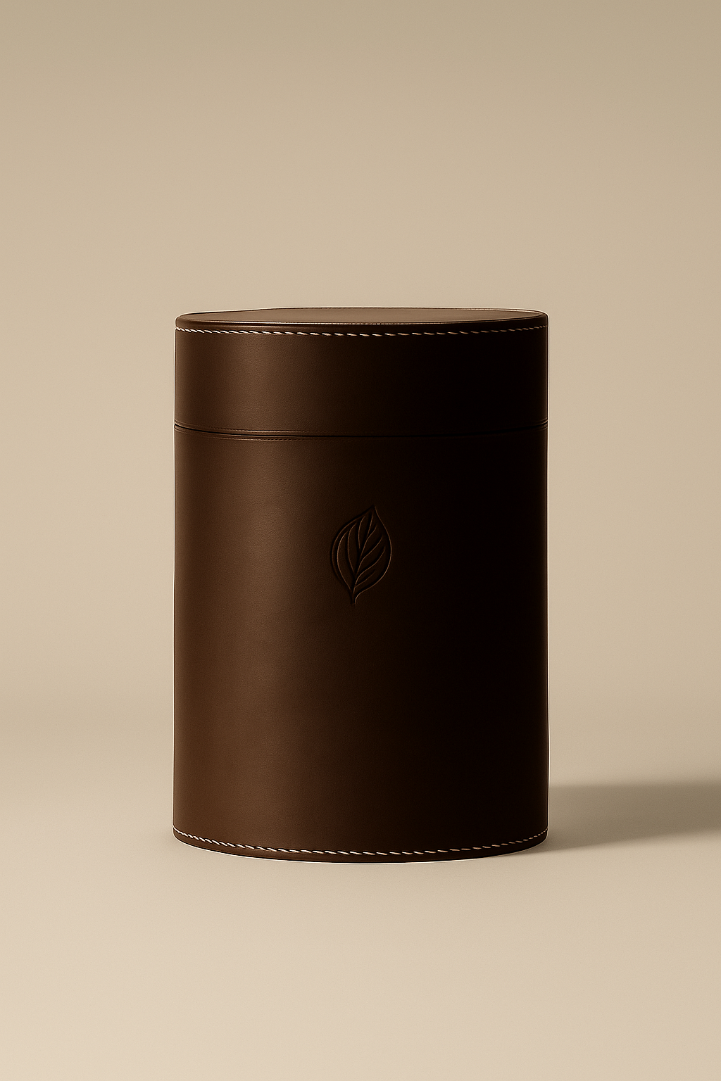 A dark brown leather Urn, handcrafted in Sweden, engraved with a personal message