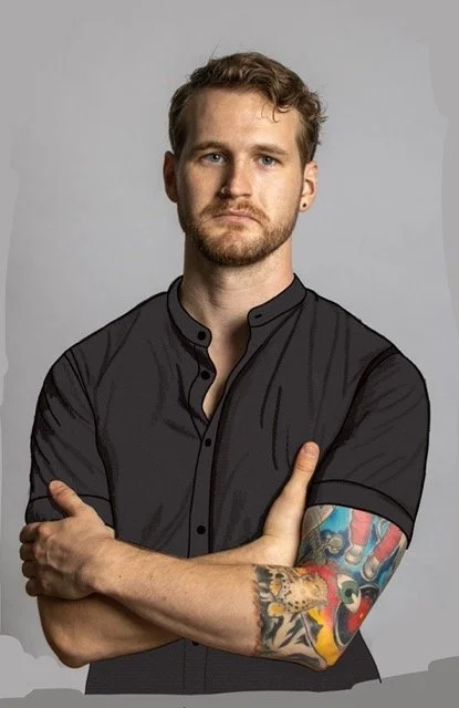 Young man with light brown hair, a beard, wearing a black button-up shirt, standing with arms crossed, showing a colorful tattoo sleeve on his left arm, against a plain gray background.