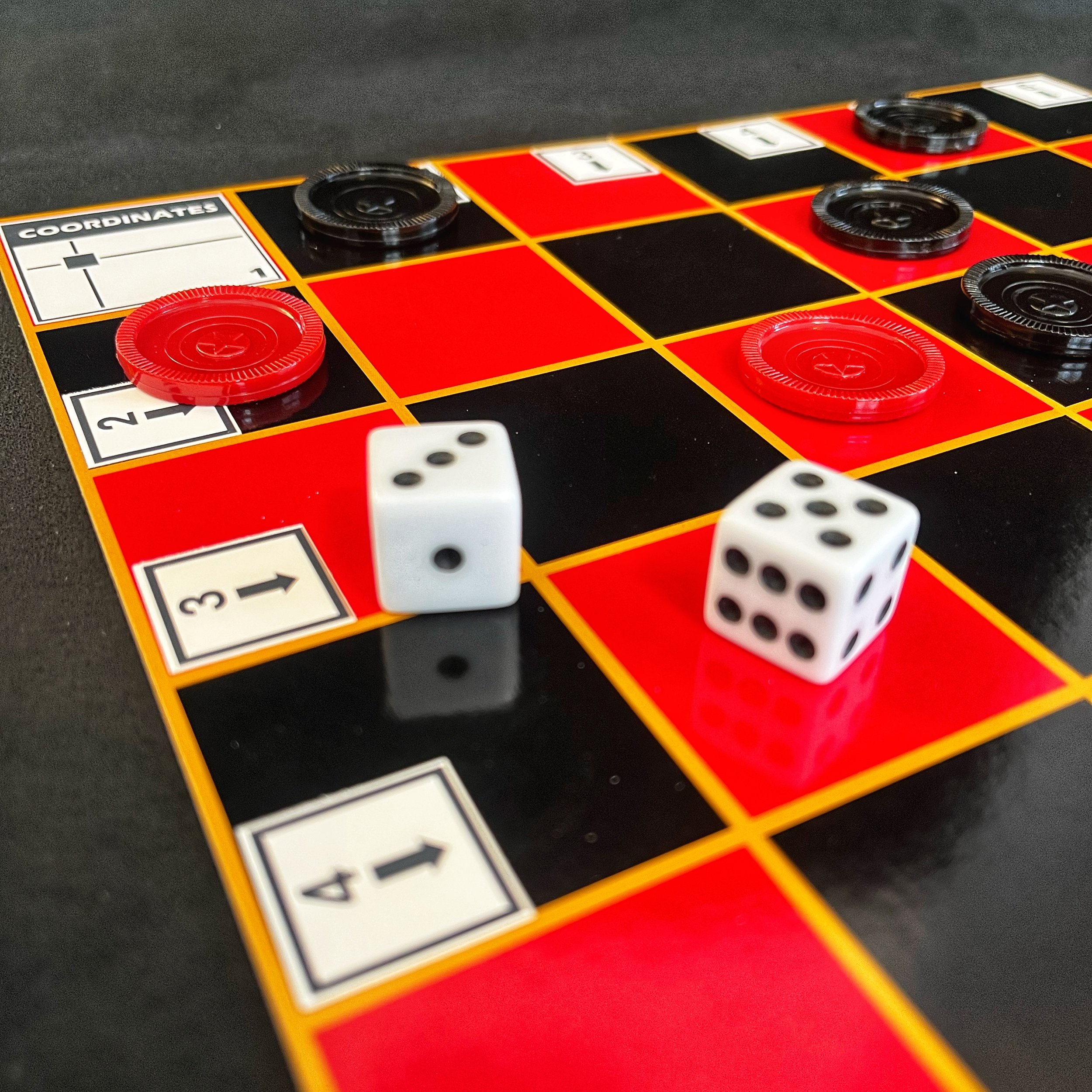 Scenic landscape with a large turquoise lake, rolling grassy hills, and rugged mountains under a cloudy sky.