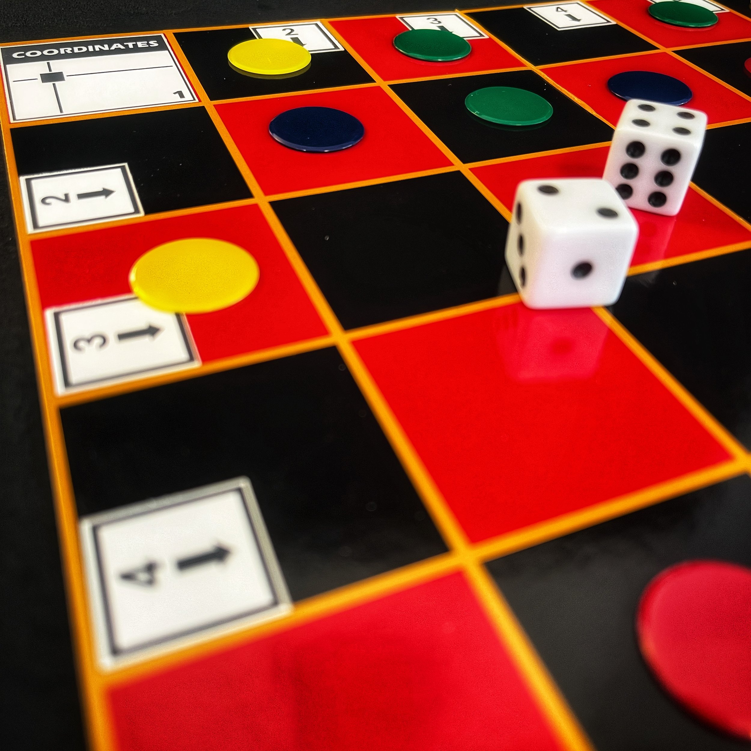 A mountain landscape with snow-capped peaks in the background, grassy hills in the midground, and a modern building on the hillside.