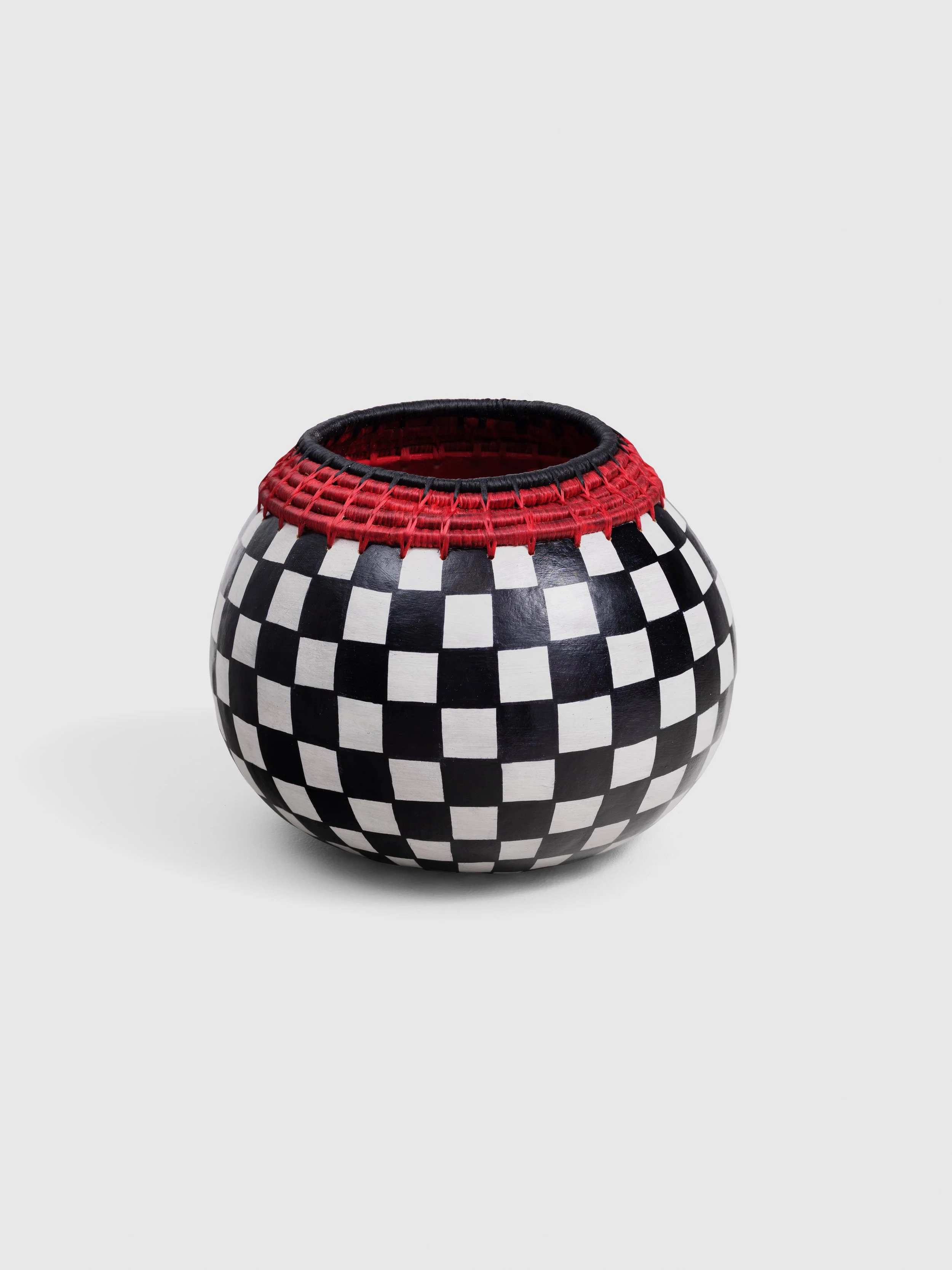 April Couch | You're Safe Here | Paint, pen and Ink on natural gourd with artificial sinew and pine needles | 8 x 6 inches | 2026