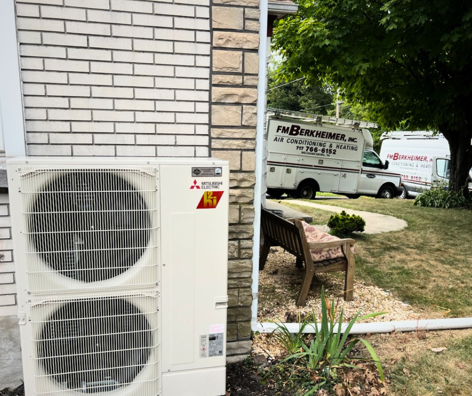 Newly installed outdoor air conditioning unit beside a home