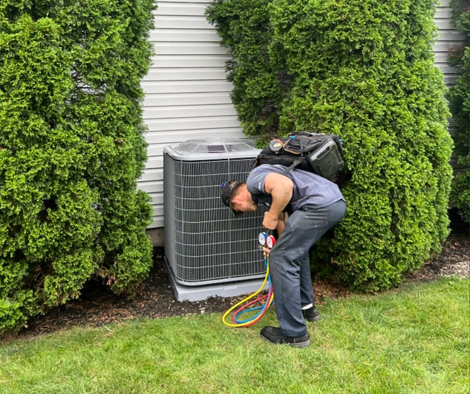 Residential HVAC system with furnace and piping during routine maintenance