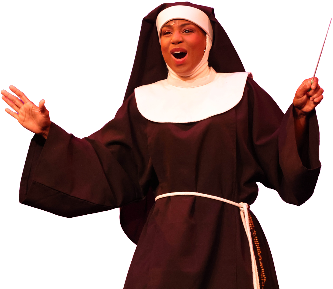 A woman dressed as a nun, performing on stage with a dramatic facial expression and holding a conductor's stick against a purple background.