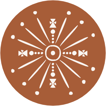 A round chocolate coin with a decorative pattern of lines, dots, and bowtie shapes embossed on the surface.