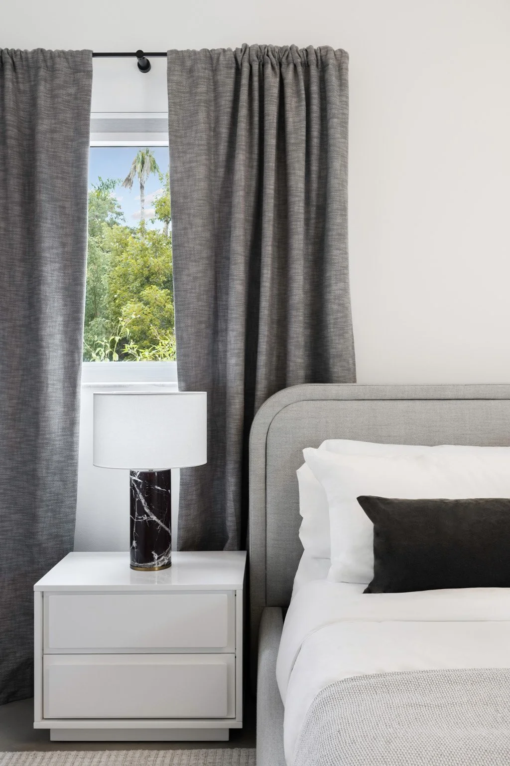 Modern bedroom with dark accents - Modernized Brutalist Architecture - Coconut Grove - CURATED. Studio