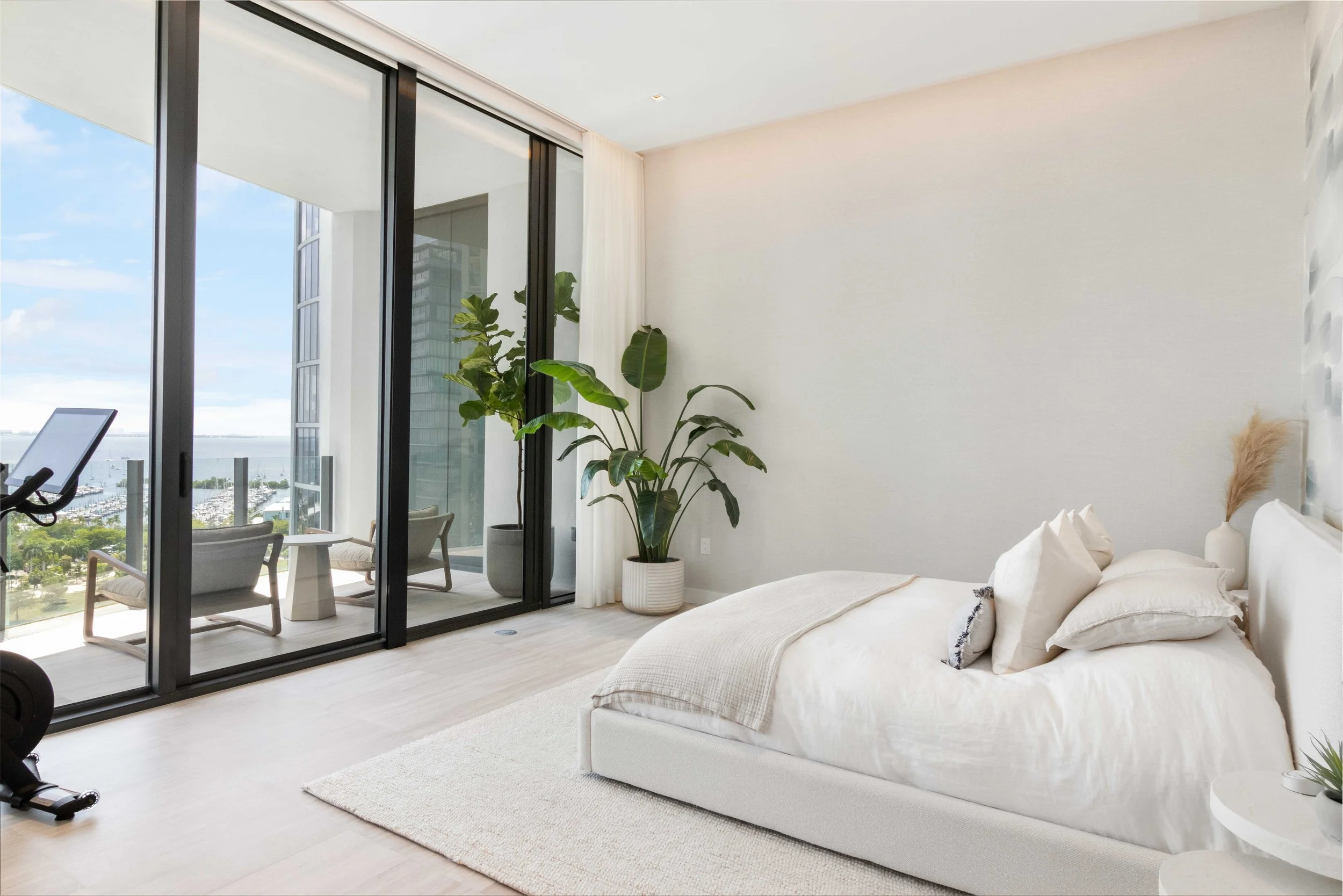 Primary bedroom overlooking Coconut Grove - Park Grove Condo - Coastal Contemporary Design - CURATED. Studio