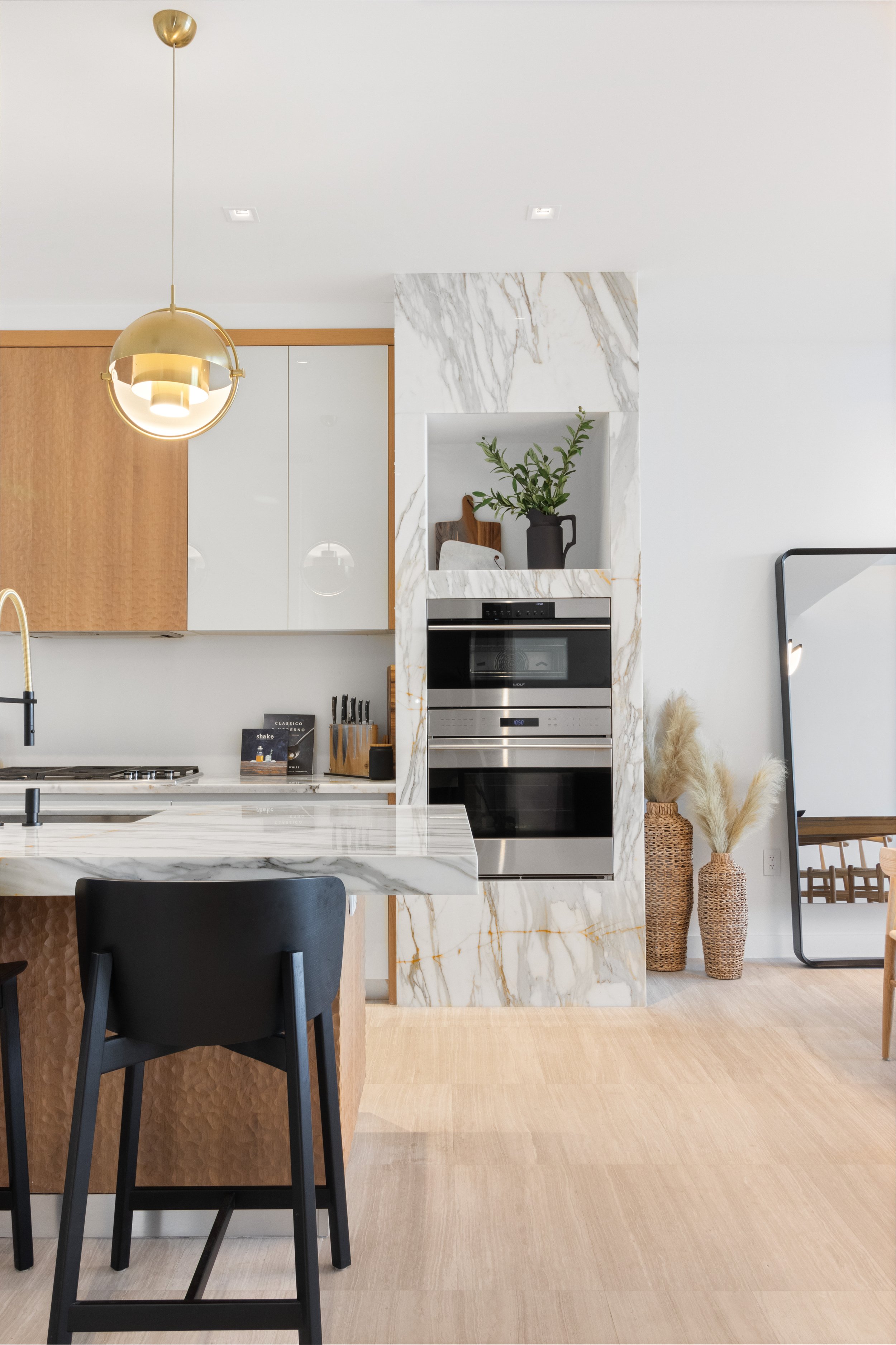 Kitchen space with organic tones - Park Grove Condo - Coastal Contemporary Design - CURATED. Studio