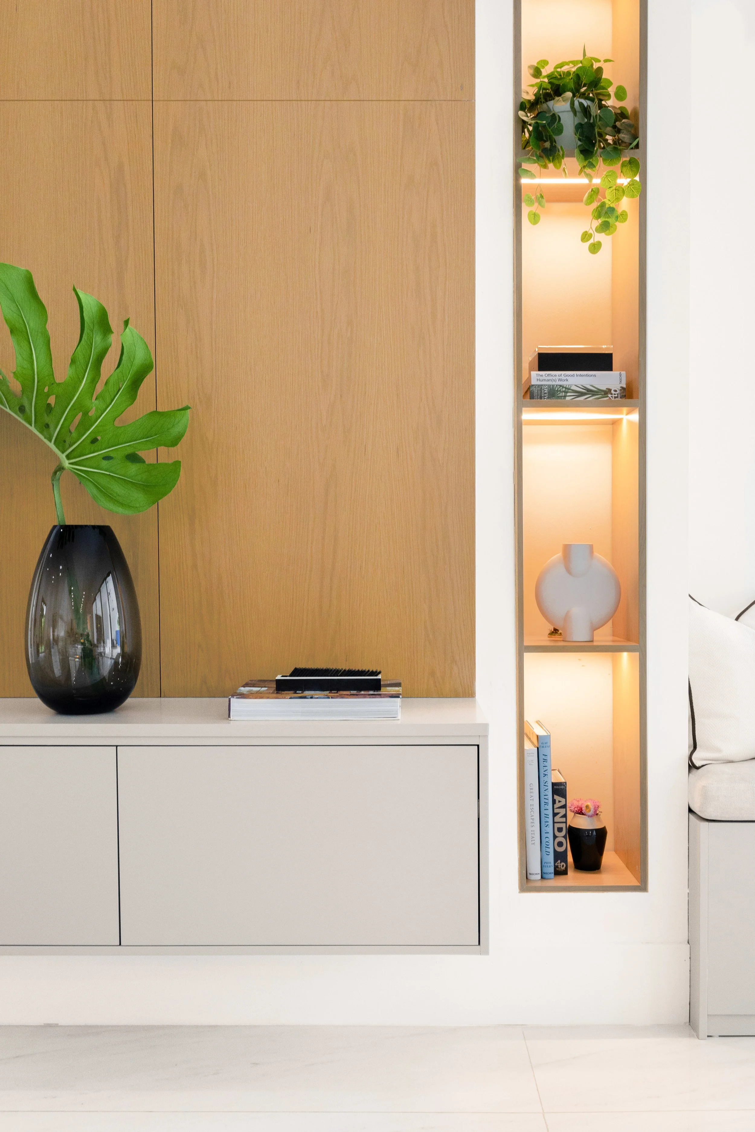 Detail shot of custom panel wall with storage space - Modern Family Estate - Pinecrest - CURATED. Studio