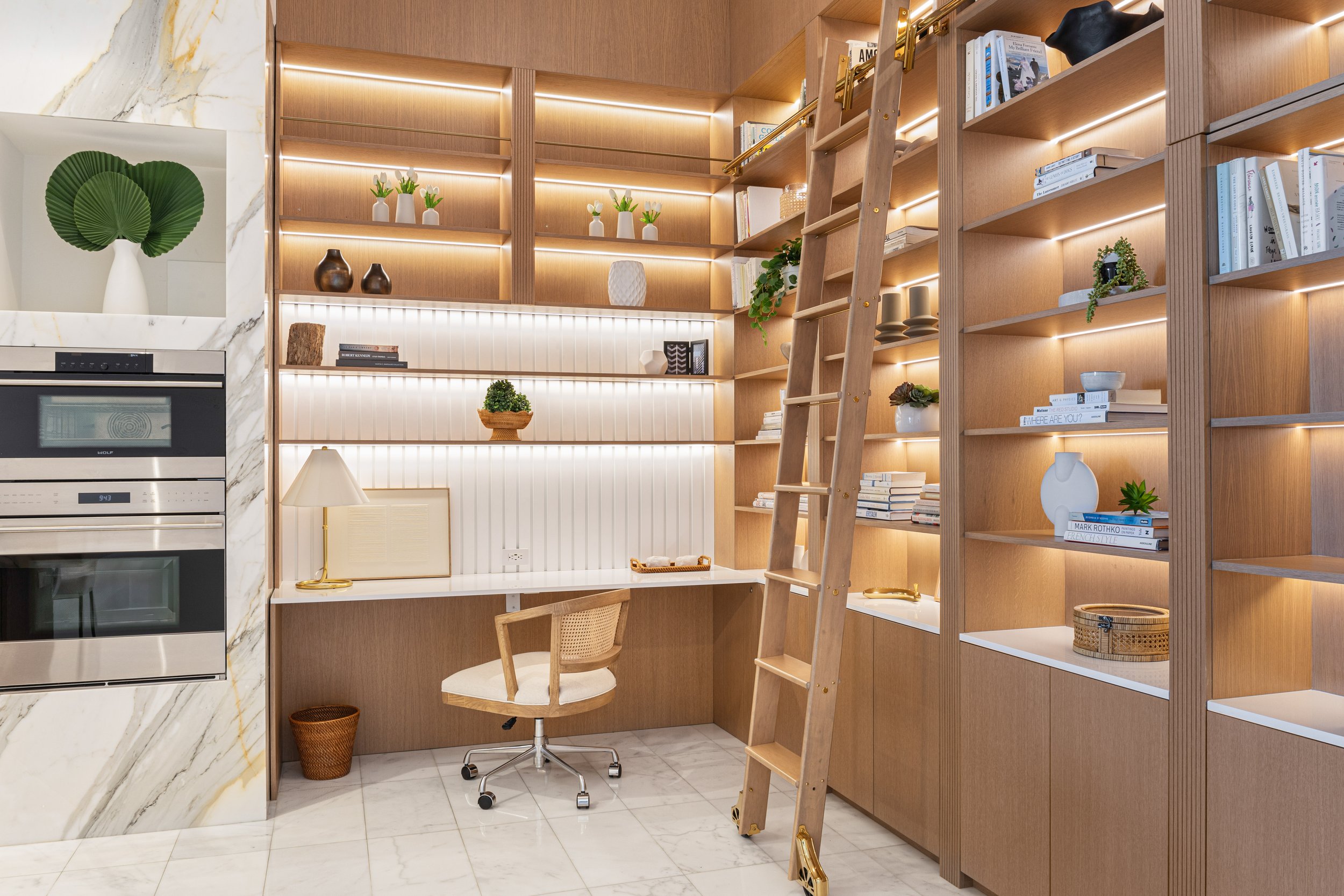 Home office with custom millwork bookshelf - Two Park Grove - Parisian Inspired Design - CURATED. Studio