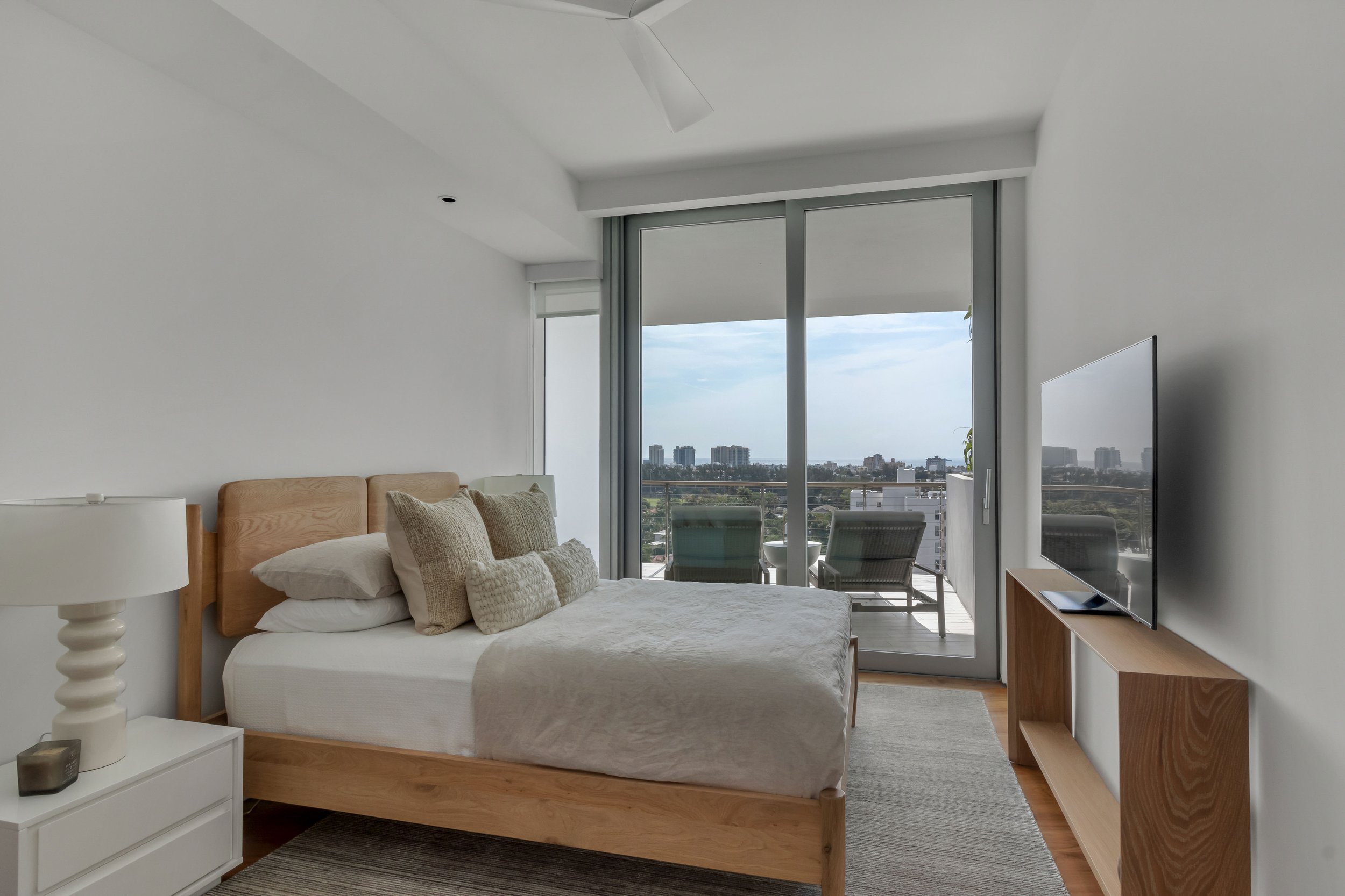 Contemporary coastal bedroom - Monad Terrace - "New Miami" Coastal Design - CURATED. Studio