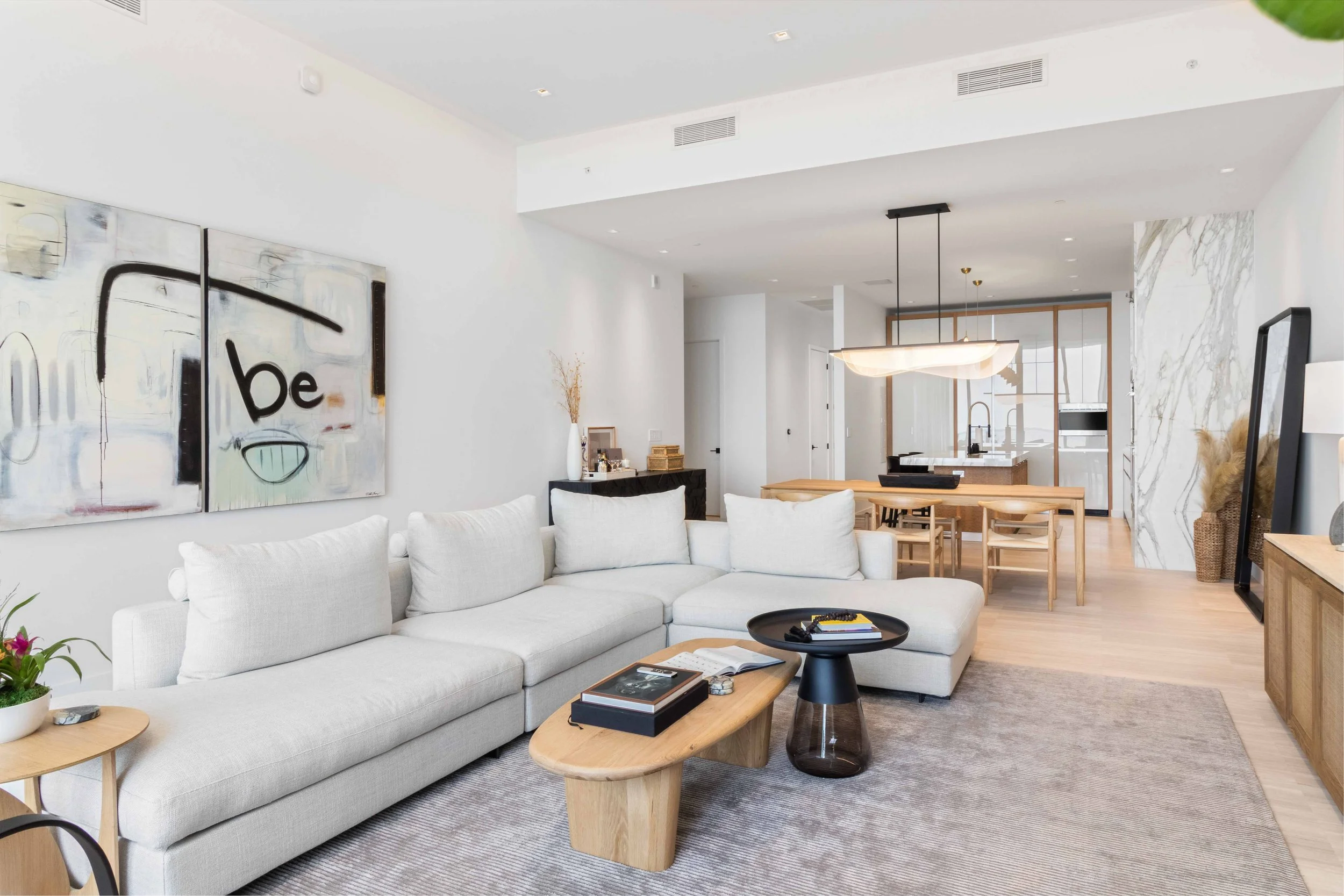 Modern open concept living space - Park Grove Condo - Coastal Contemporary Design - CURATED. Studio