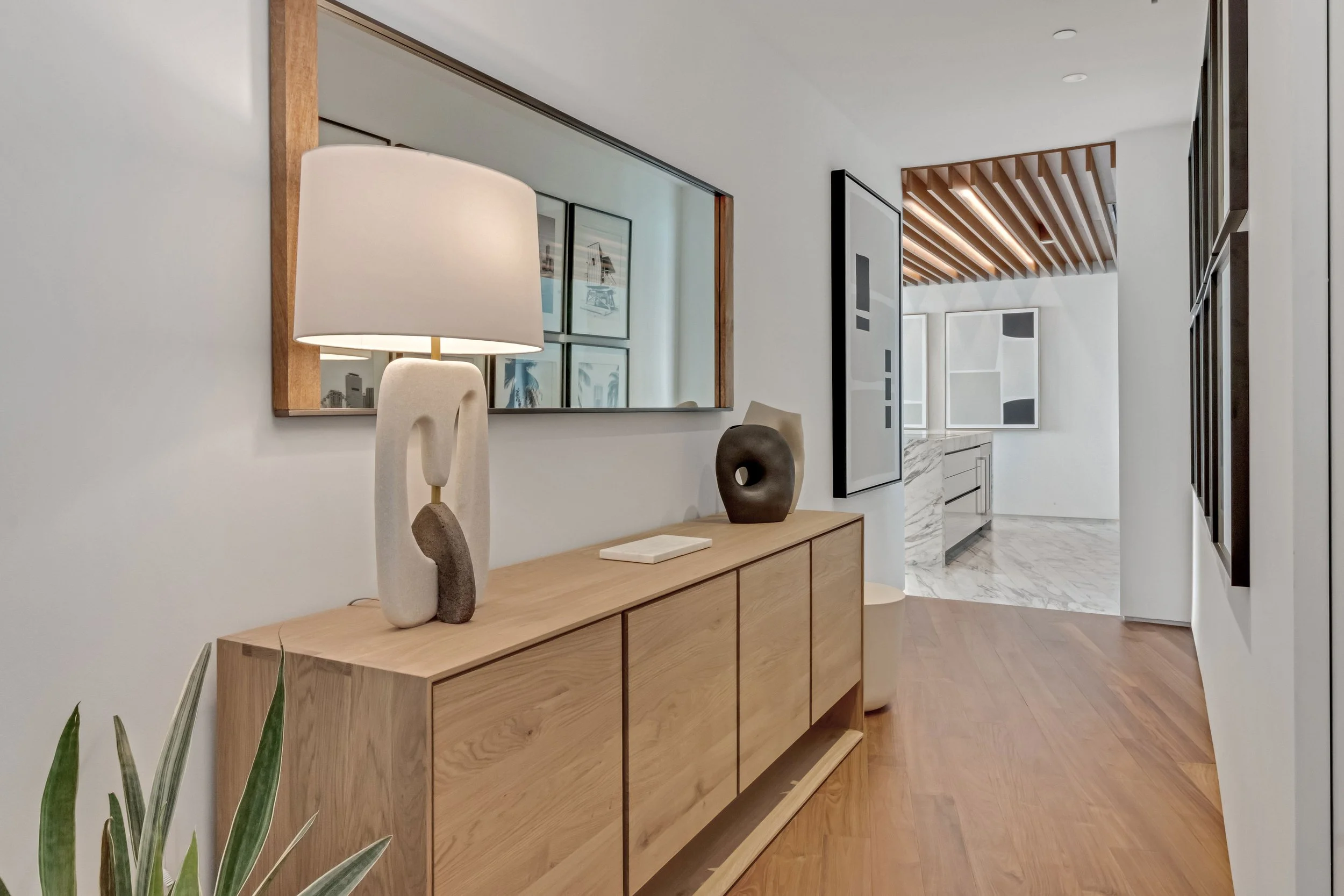 Contemporary interior hallway - Monad Terrace - "New Miami" Coastal Design - CURATED. Studio