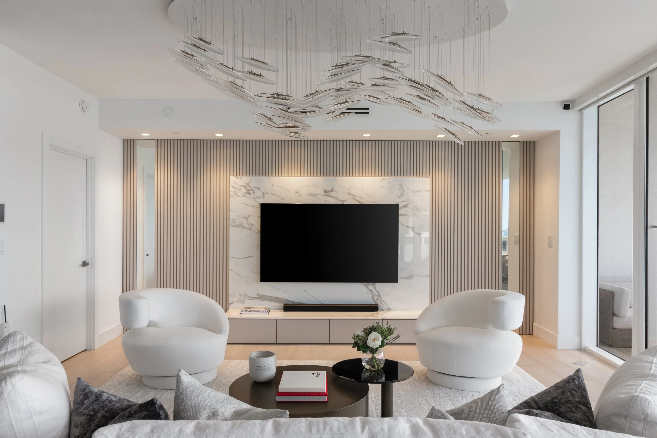 Modern living room with custom millwork - Murano Grande - South of Fifth Design - CURATED. Studio