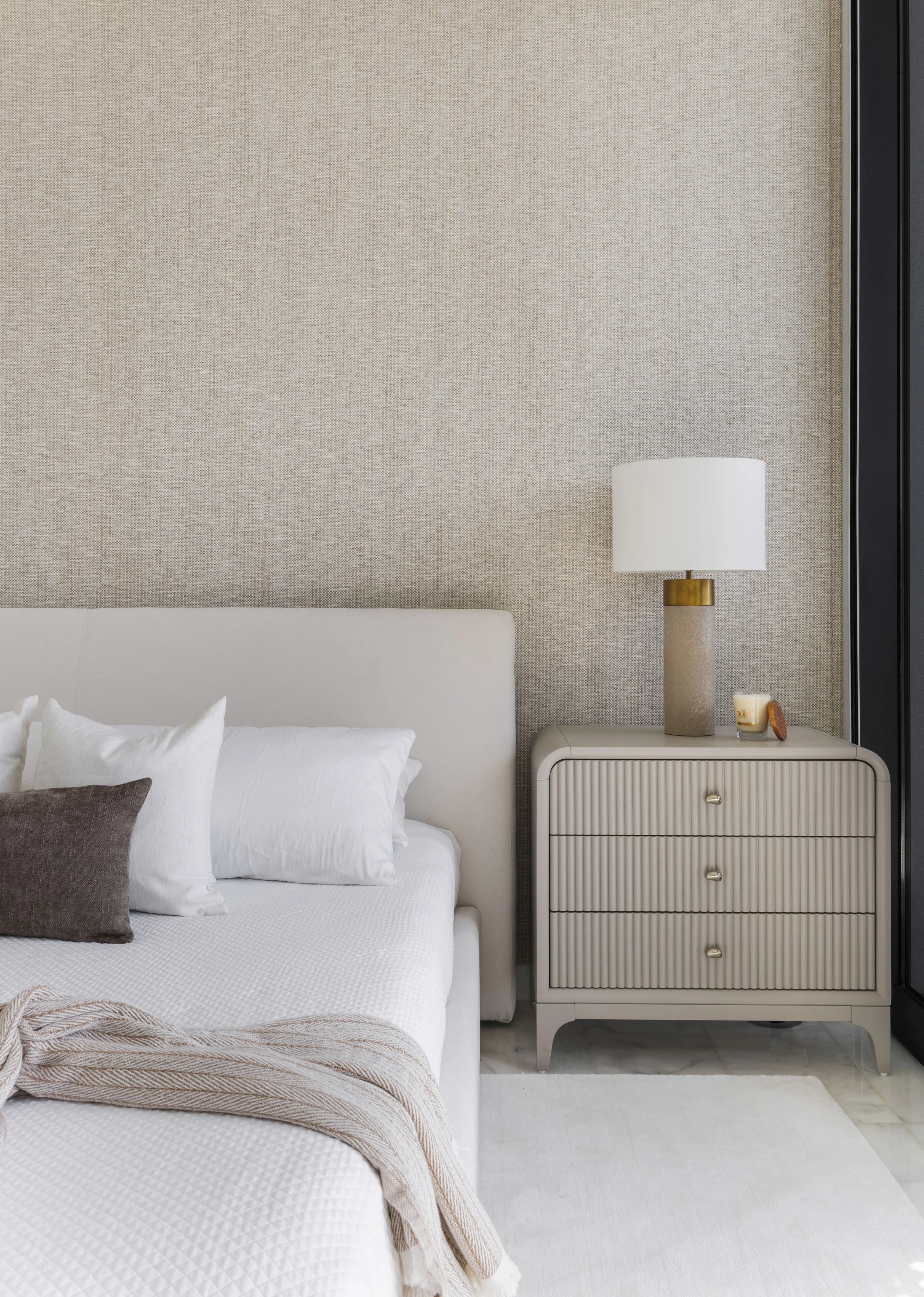 Detail shot of bed plus nightstand and wallpaper - Parisian Inspired Design - CURATED. Studio