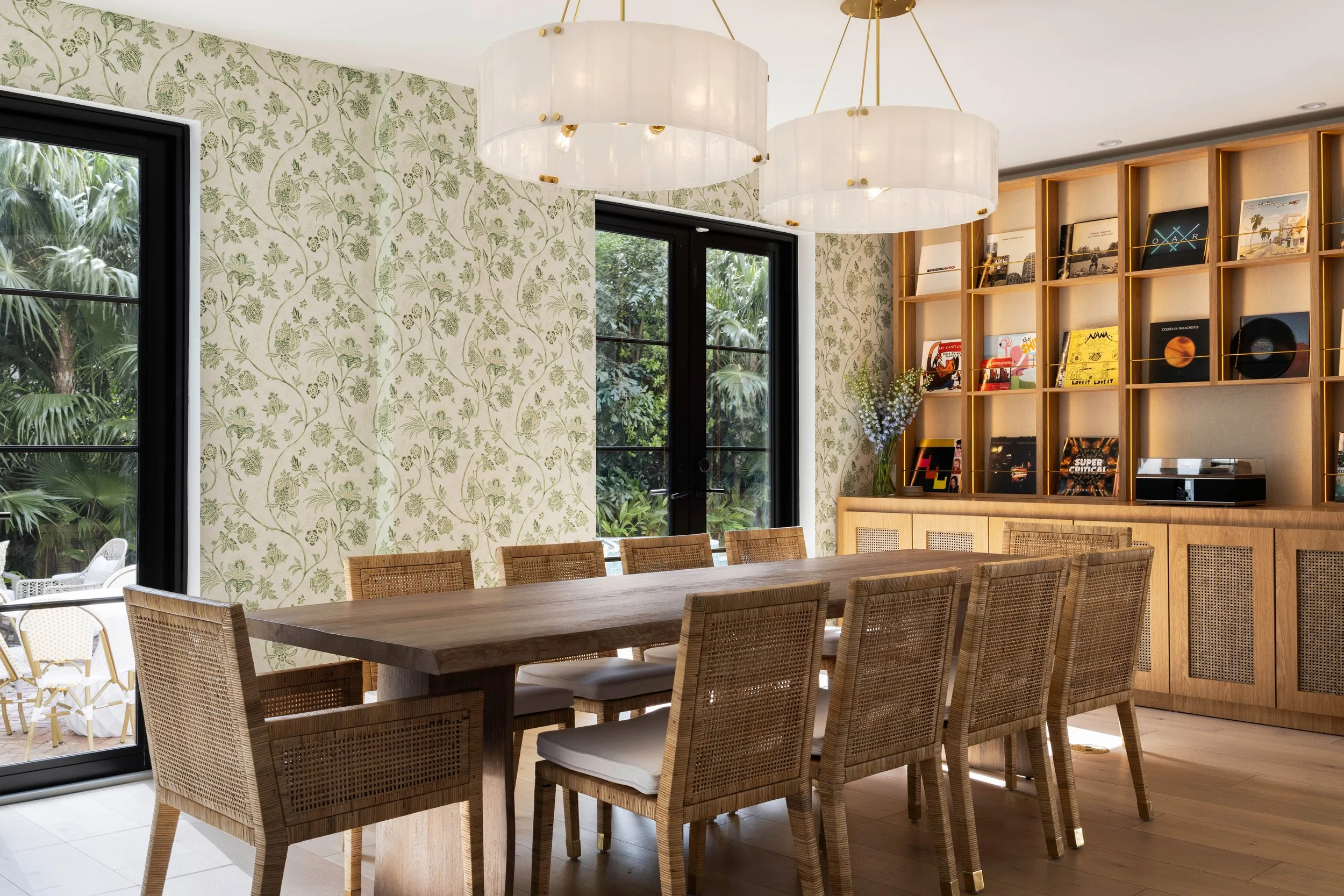 Well lit dining room space with cane chairs  - Coastal Boho Estate - Coconut Grove - CURATED. Studio