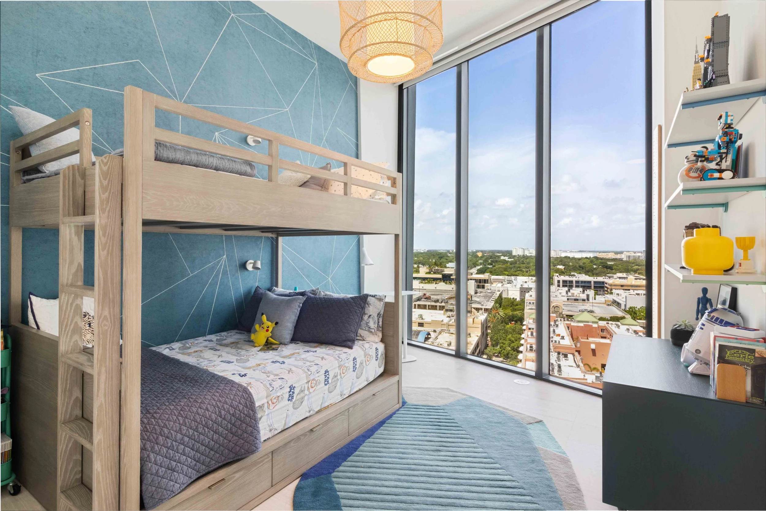 Kids bedroom with blue wallpaper - Park Grove Condo - Coastal Contemporary Design - CURATED. Studio