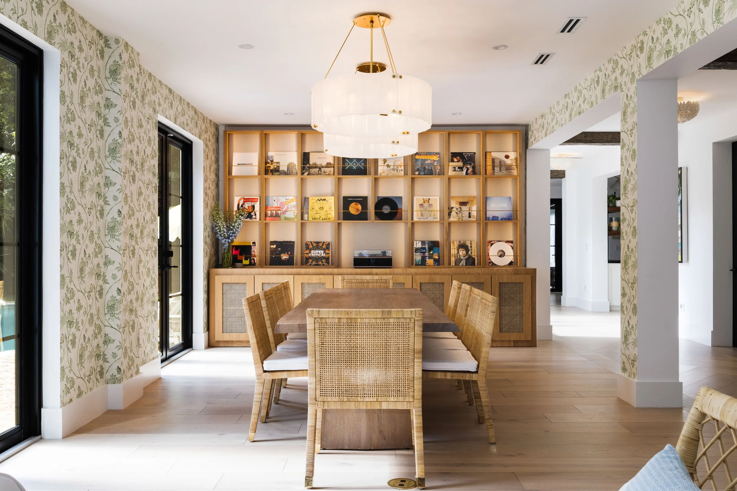 Dining space with custom record wall - Coastal Boho Estate - Coconut Grove - CURATED. Studio