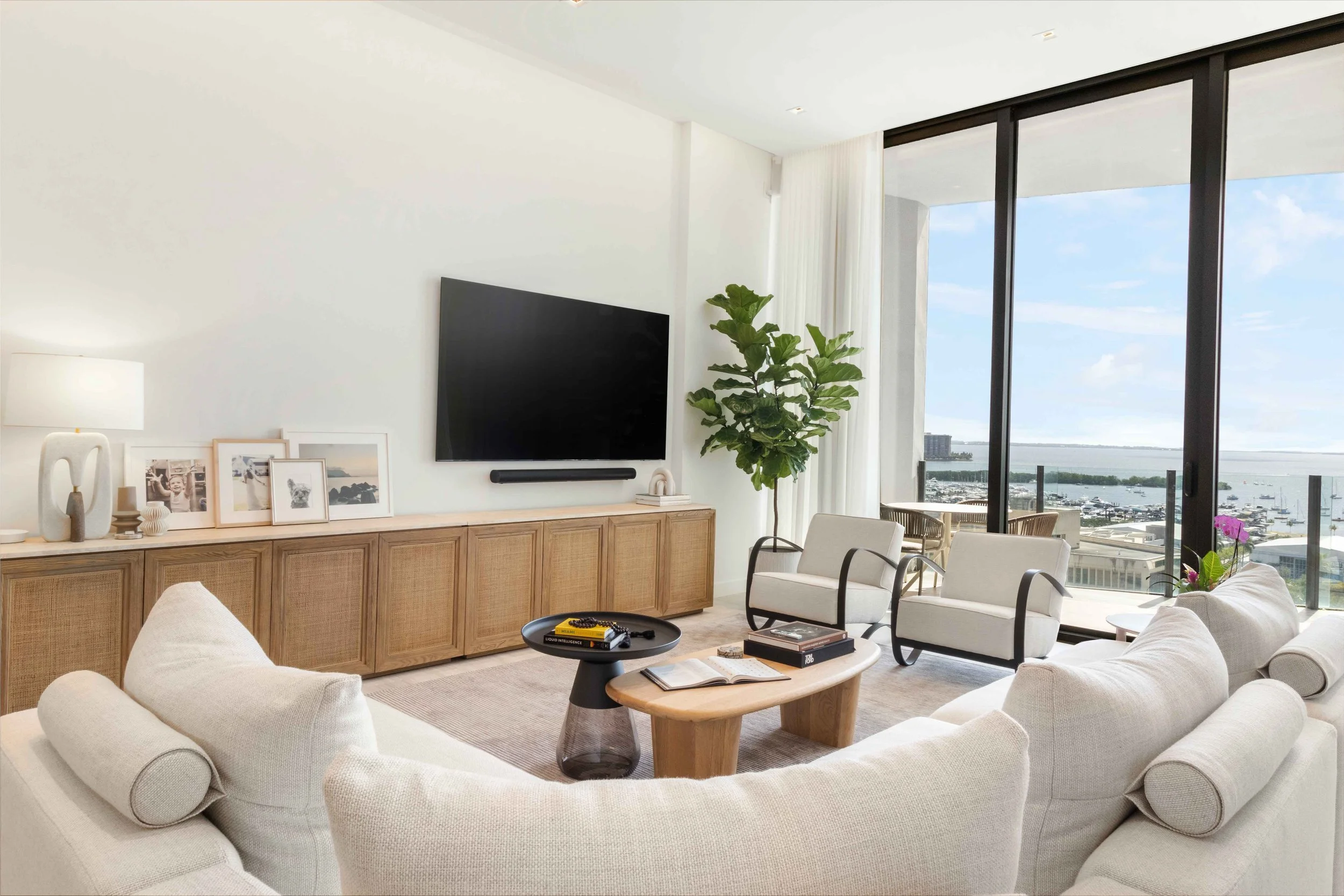 Modern open concept living and dining space - Park Grove Condo - Coastal Contemporary Design - CURATED. Studio