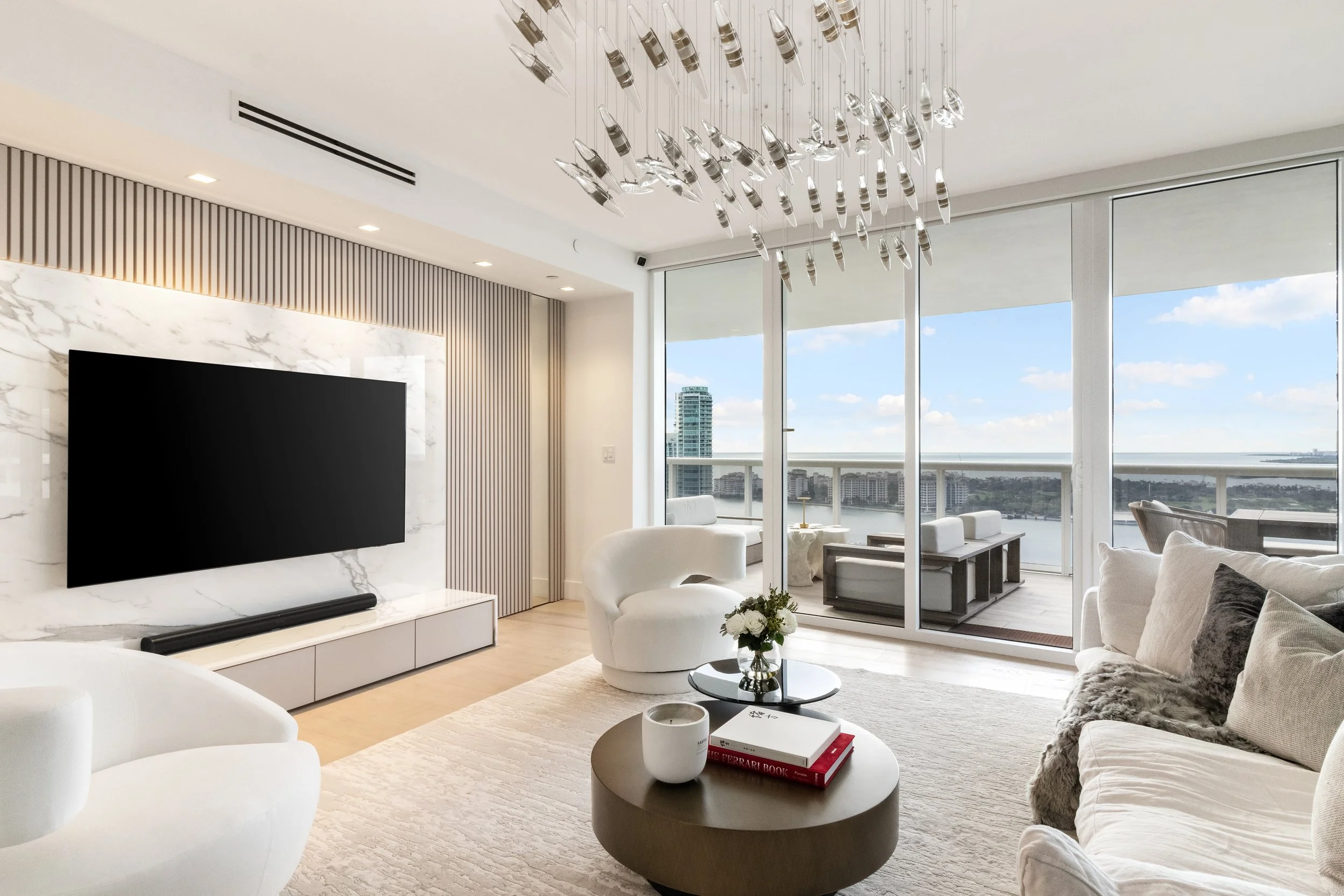 Modern living room overlooking the Port of Miami - Murano Grande - South of Fifth Design - CURATED. Studio