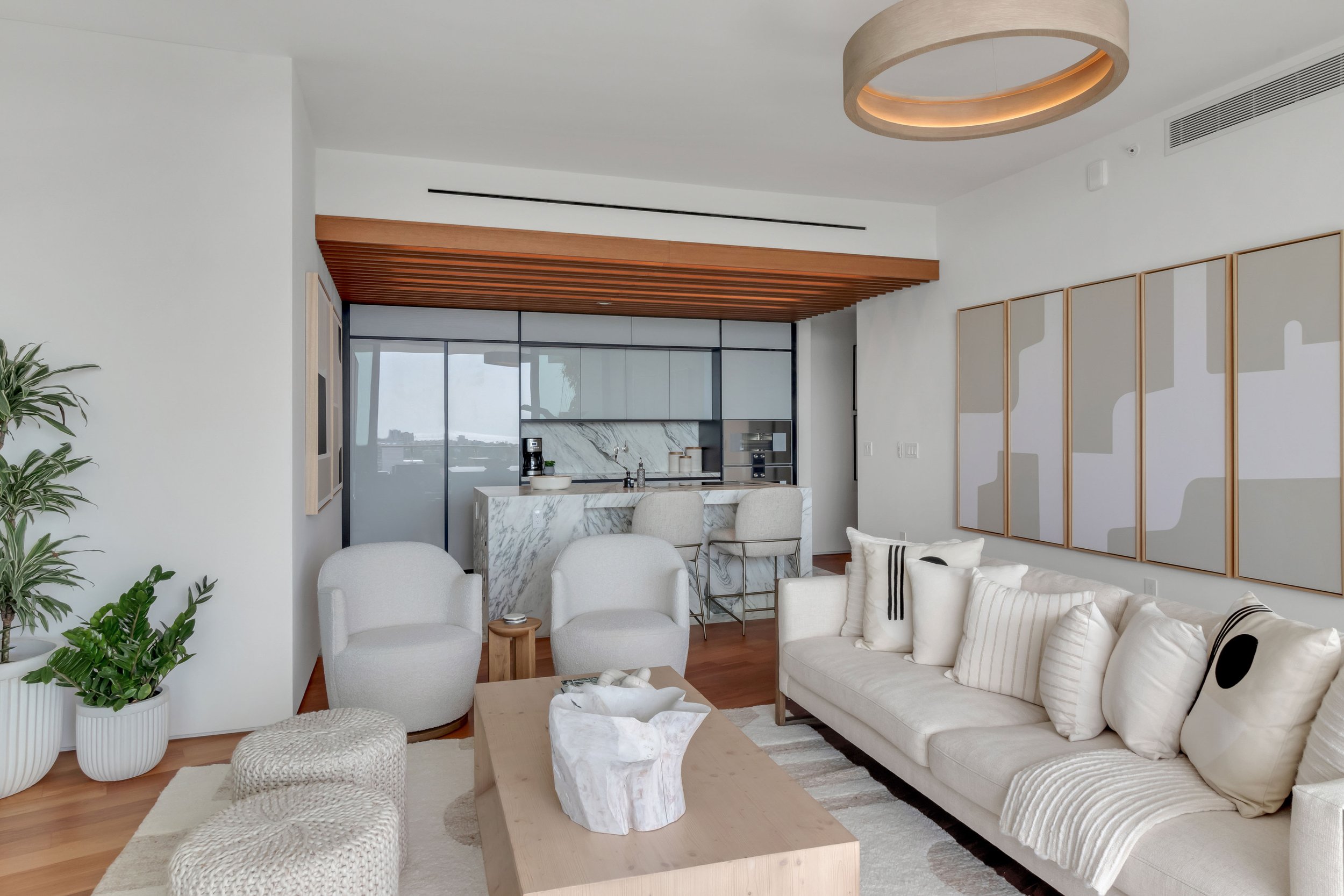 Contemporary open plan living space - Monad Terrace - "New Miami" Coastal Design - CURATED. Studio