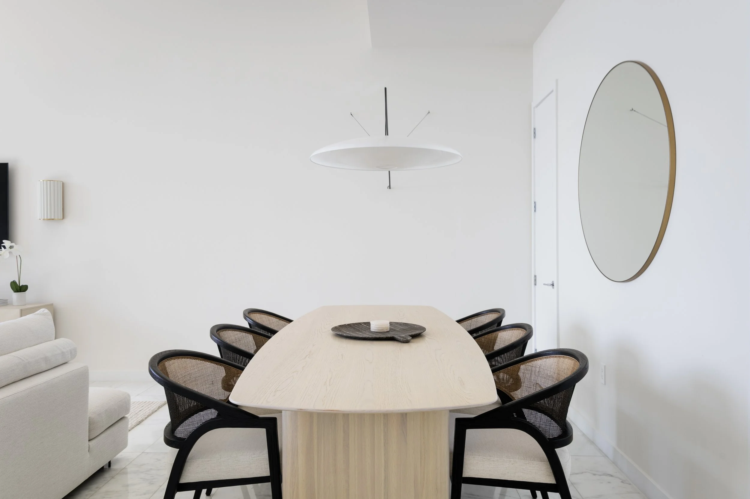 Dining room with accent lamp - Parisian Inspired Design - CURATED. Studio