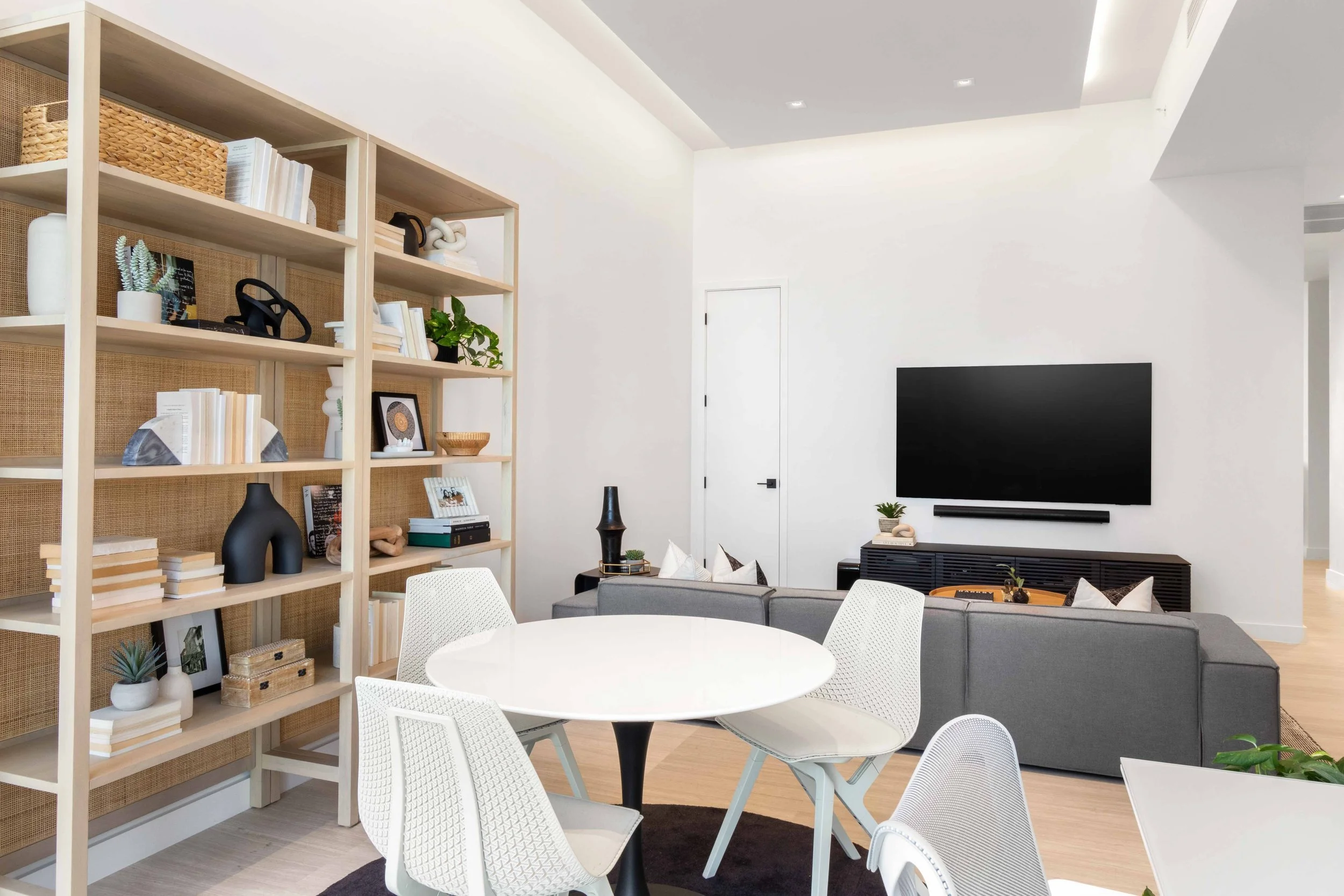 Family room in Coconut Grove - Park Grove Condo - Coastal Contemporary Design - CURATED. Studio