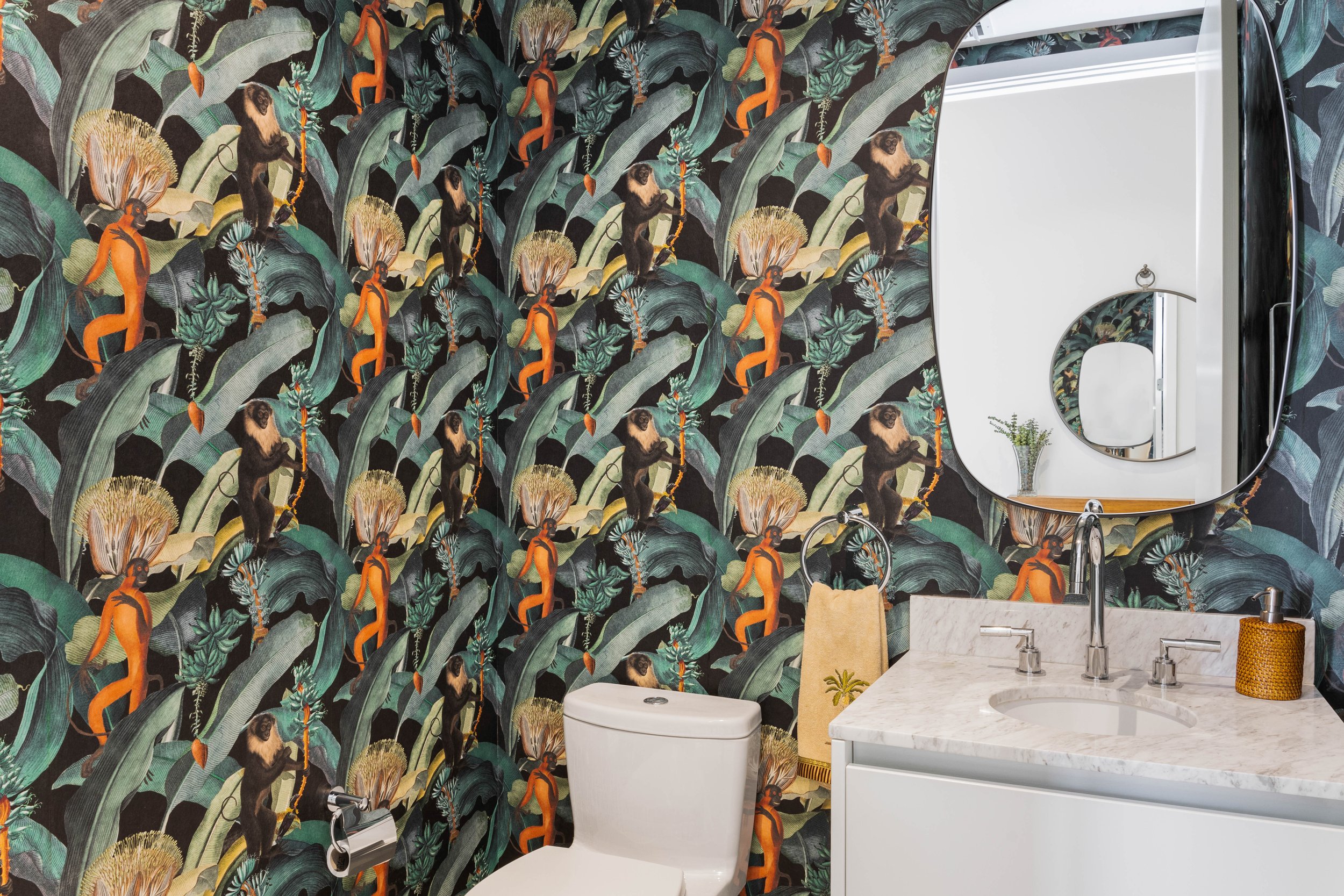 Powder room with jungle wallpaper - Parisian Inspired Design - CURATED. Studio