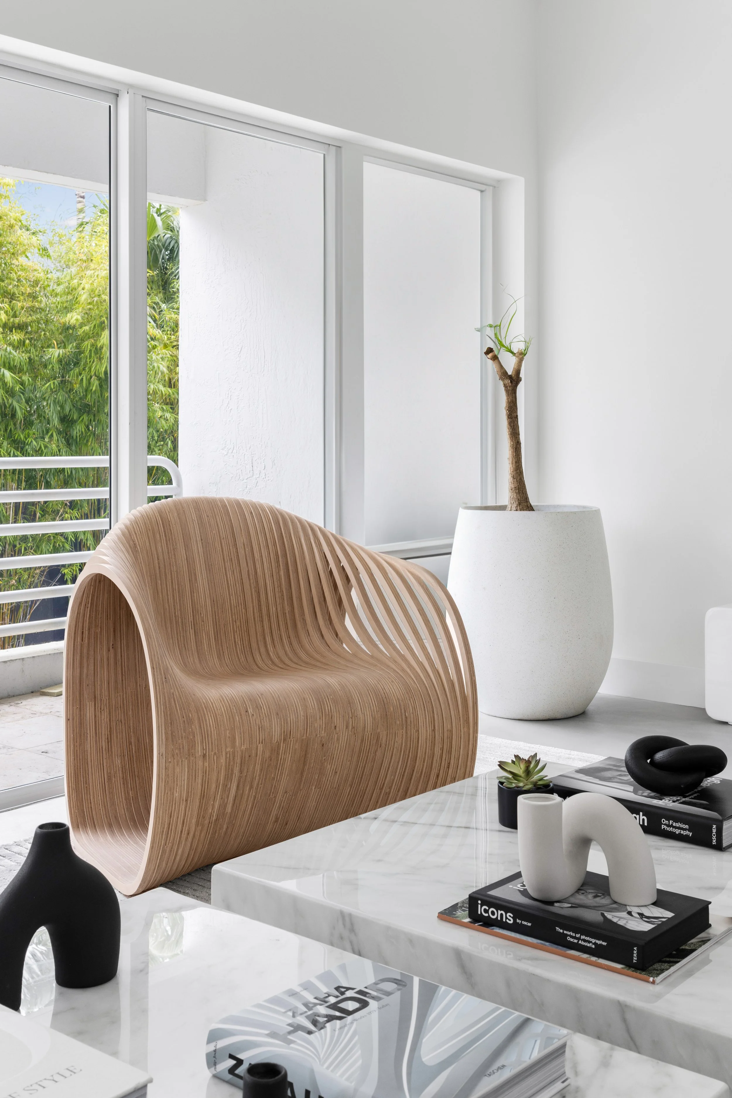 Detail shot of sculptural accent chairs - Modernized Brutalist Architecture - Coconut Grove - CURATED. Studio