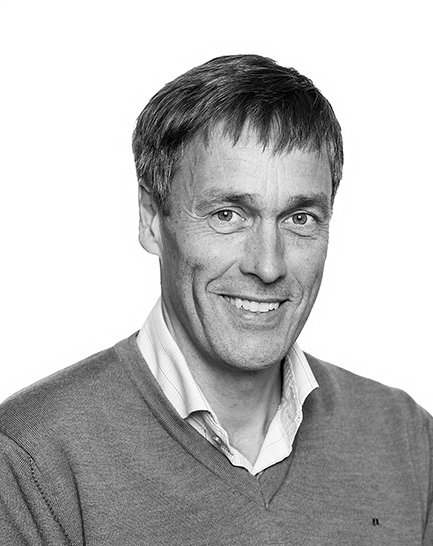 Porträtt av Peter Vornefeld som ler mot kameran.