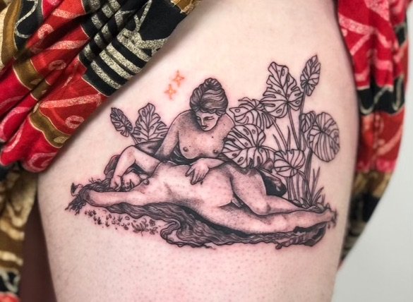 Tattoo of a woman reclining on a large animal, surrounded by tropical leaves, with two orange stars above.